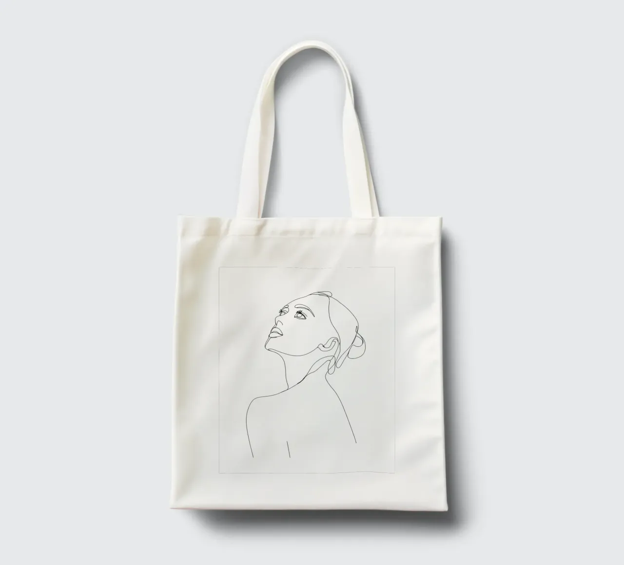 Woman Face Minimalist Line Art tote bag by Viv Line Art