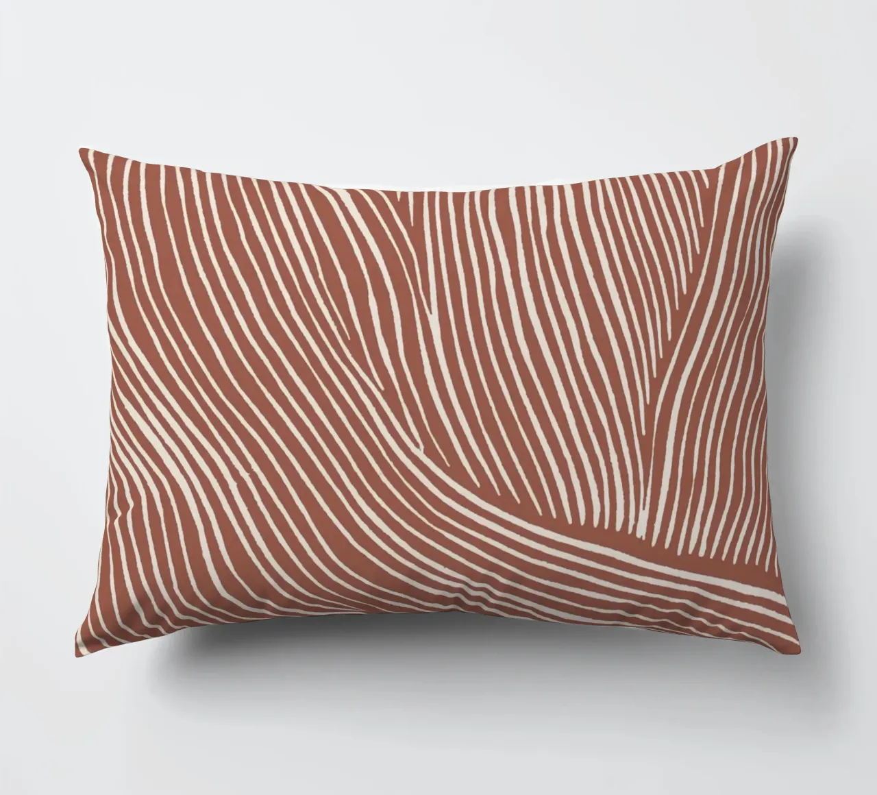 Terracotta linoleumsneden kussen van NouveauPrints