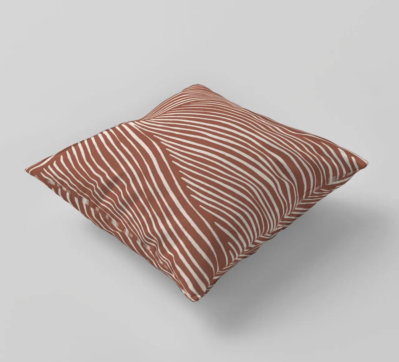 Terracotta linoleumsneden kussen van NouveauPrints