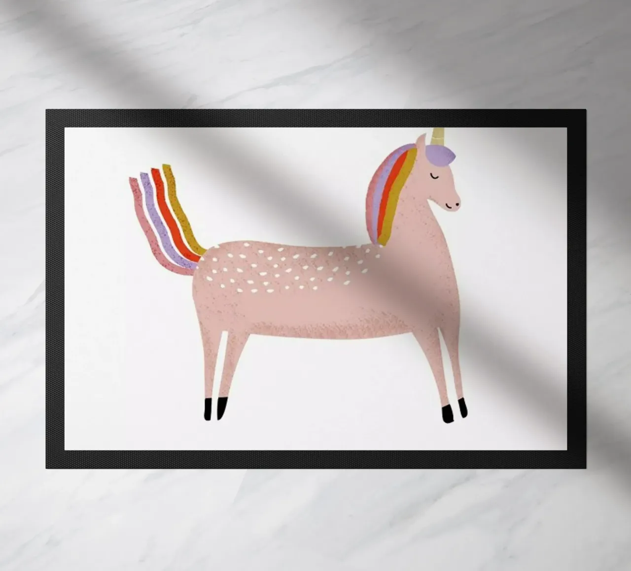 Unicorn felpudo de Little Flourishes