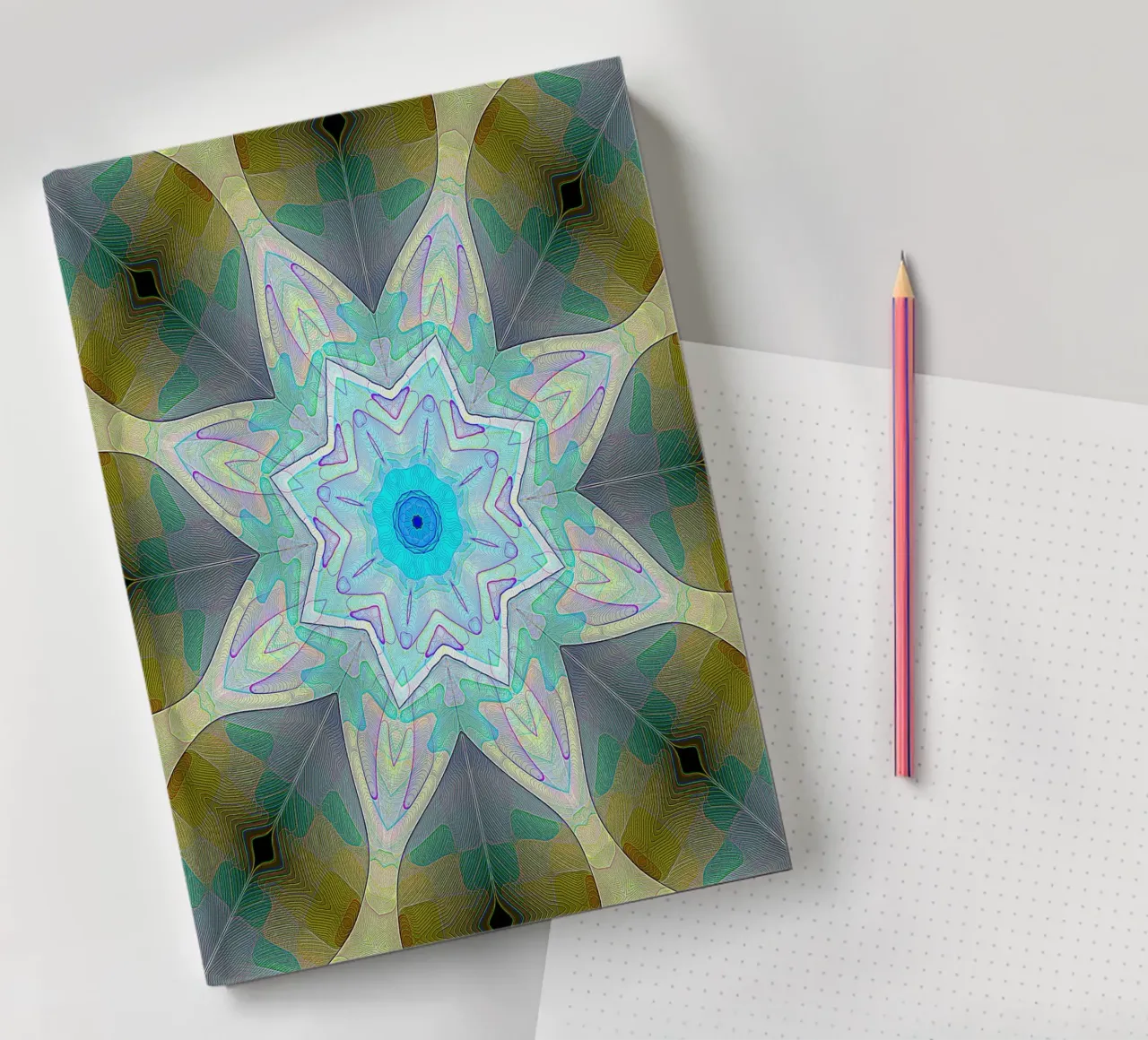 Turquoise blue star framed by patterned leaf shapes ... notebook by Gürsel Yesil Digital Art