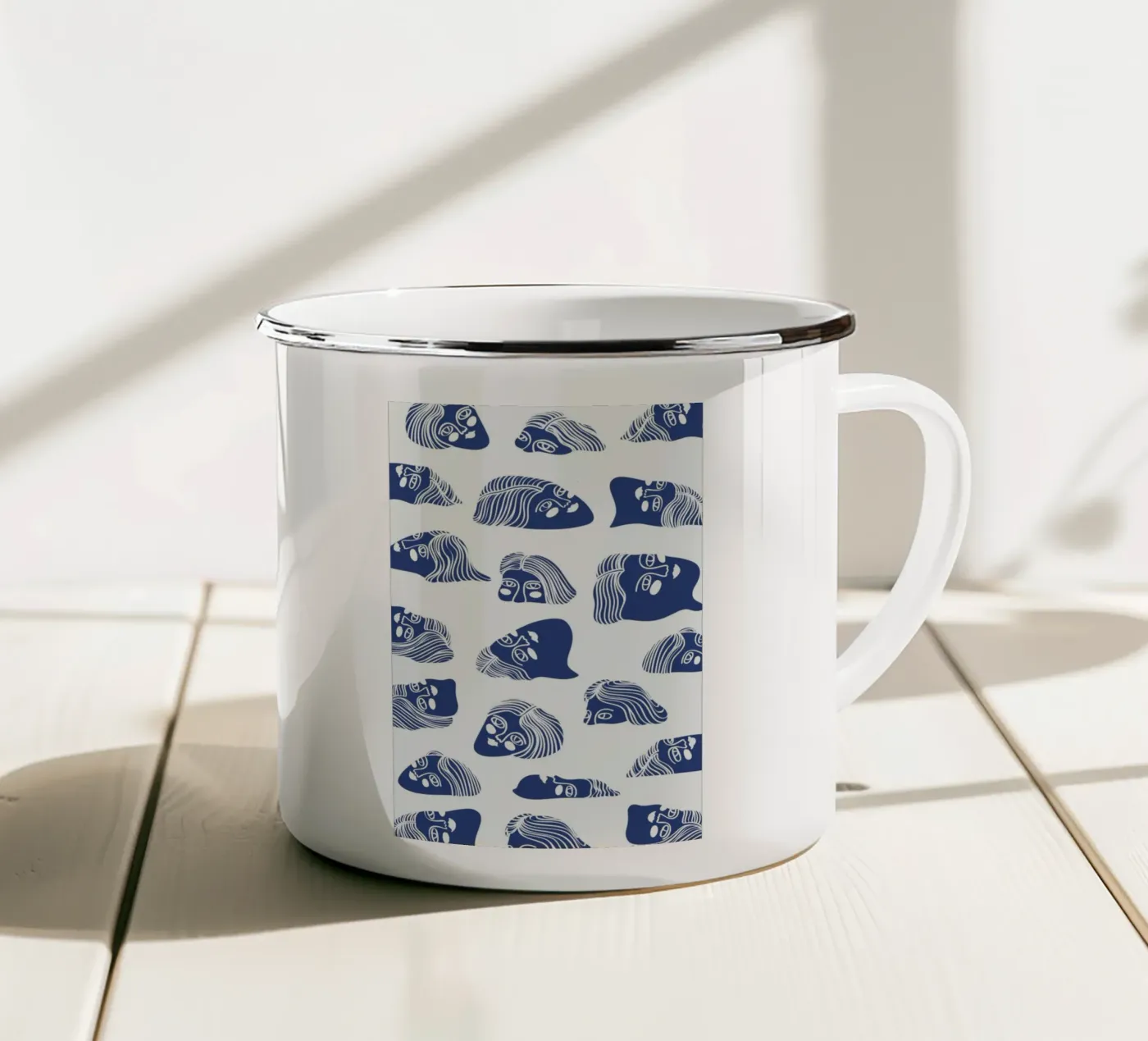 Faces enamel mug by Pure