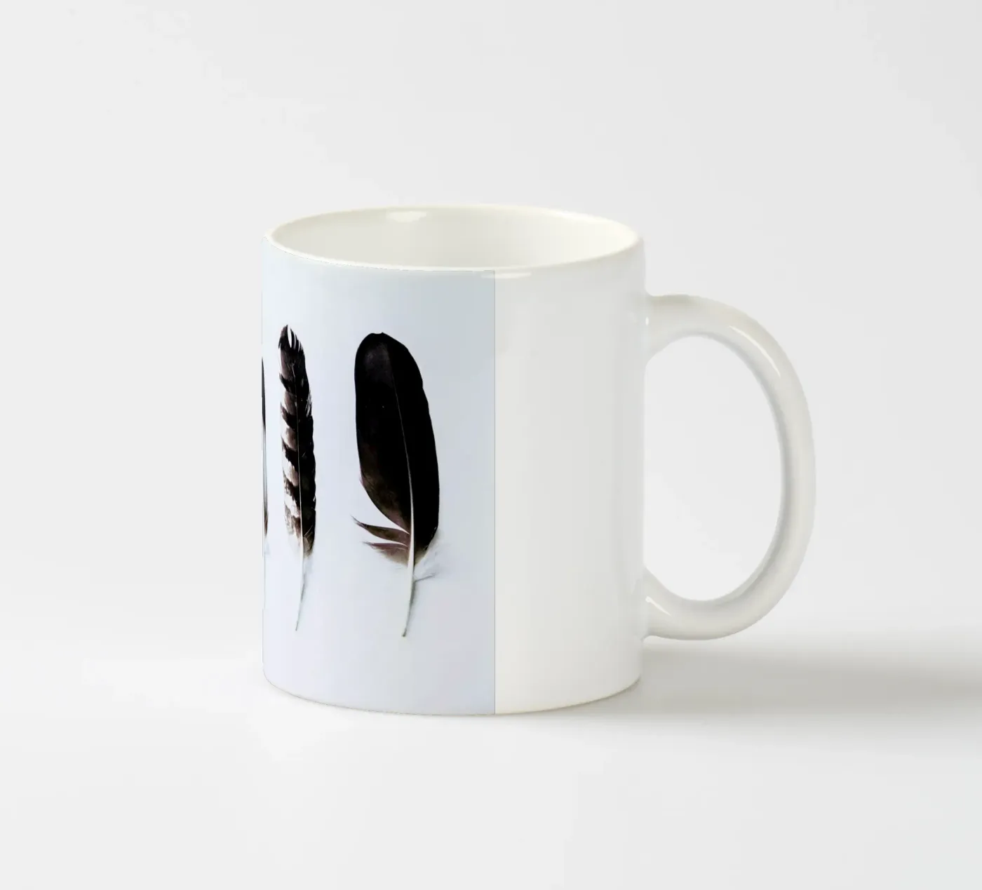 Feathers ceramic mug by Victoria Frost