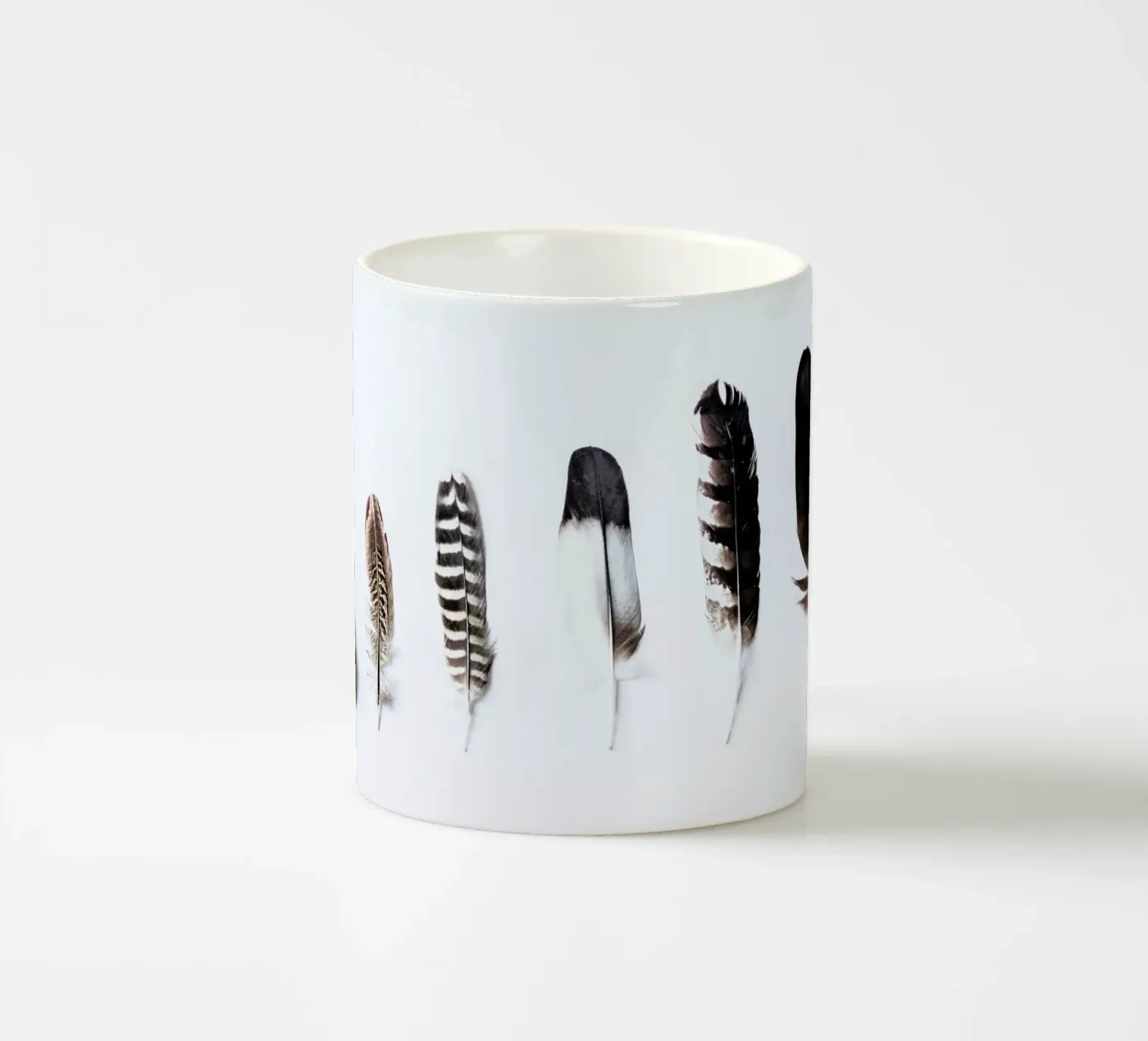 Feathers ceramic mug by Victoria Frost