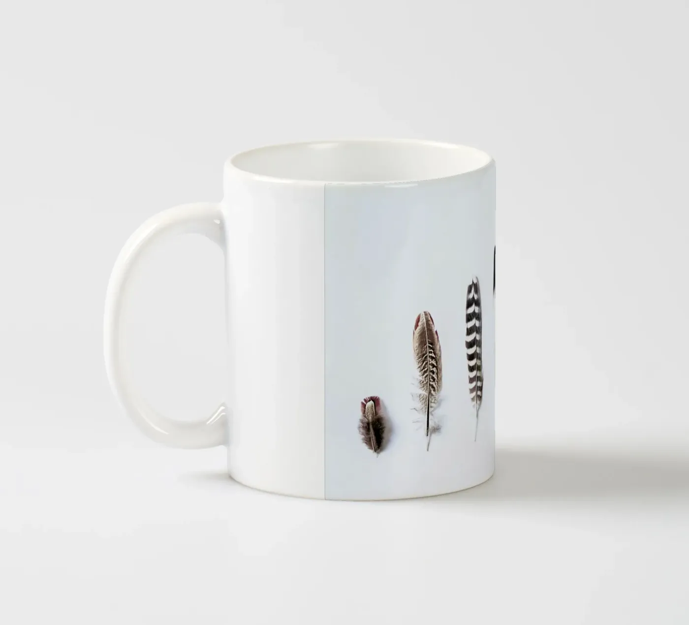 Feathers ceramic mug by Victoria Frost