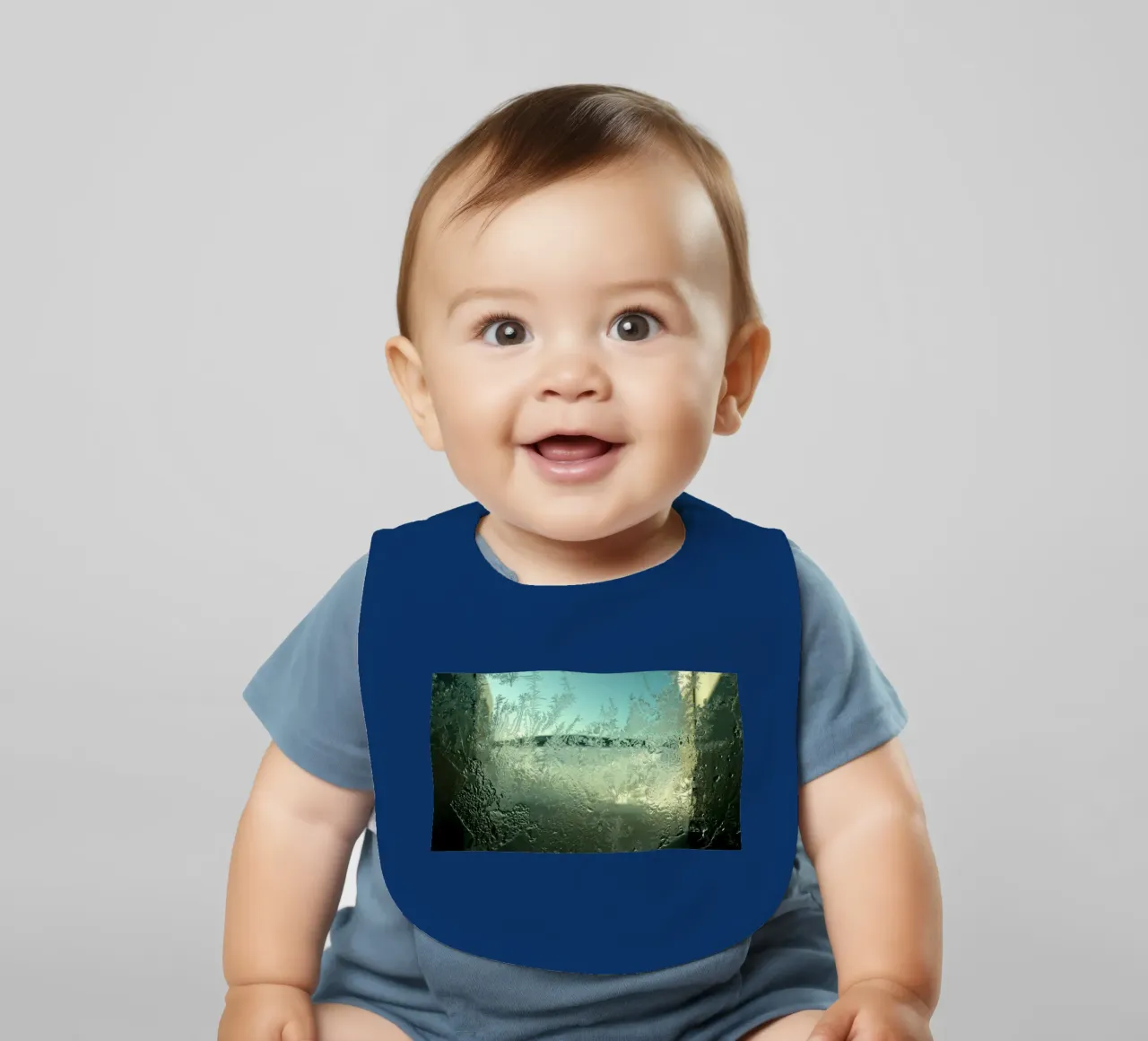 Winter window baby bib by Massimo Frascogna