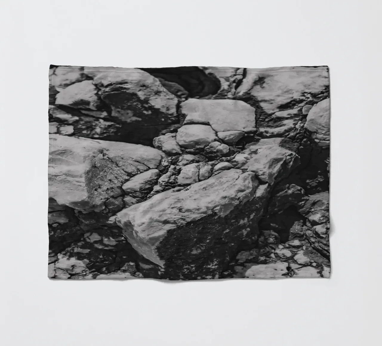 Solid stone structure fleece blanket by Carinaprint