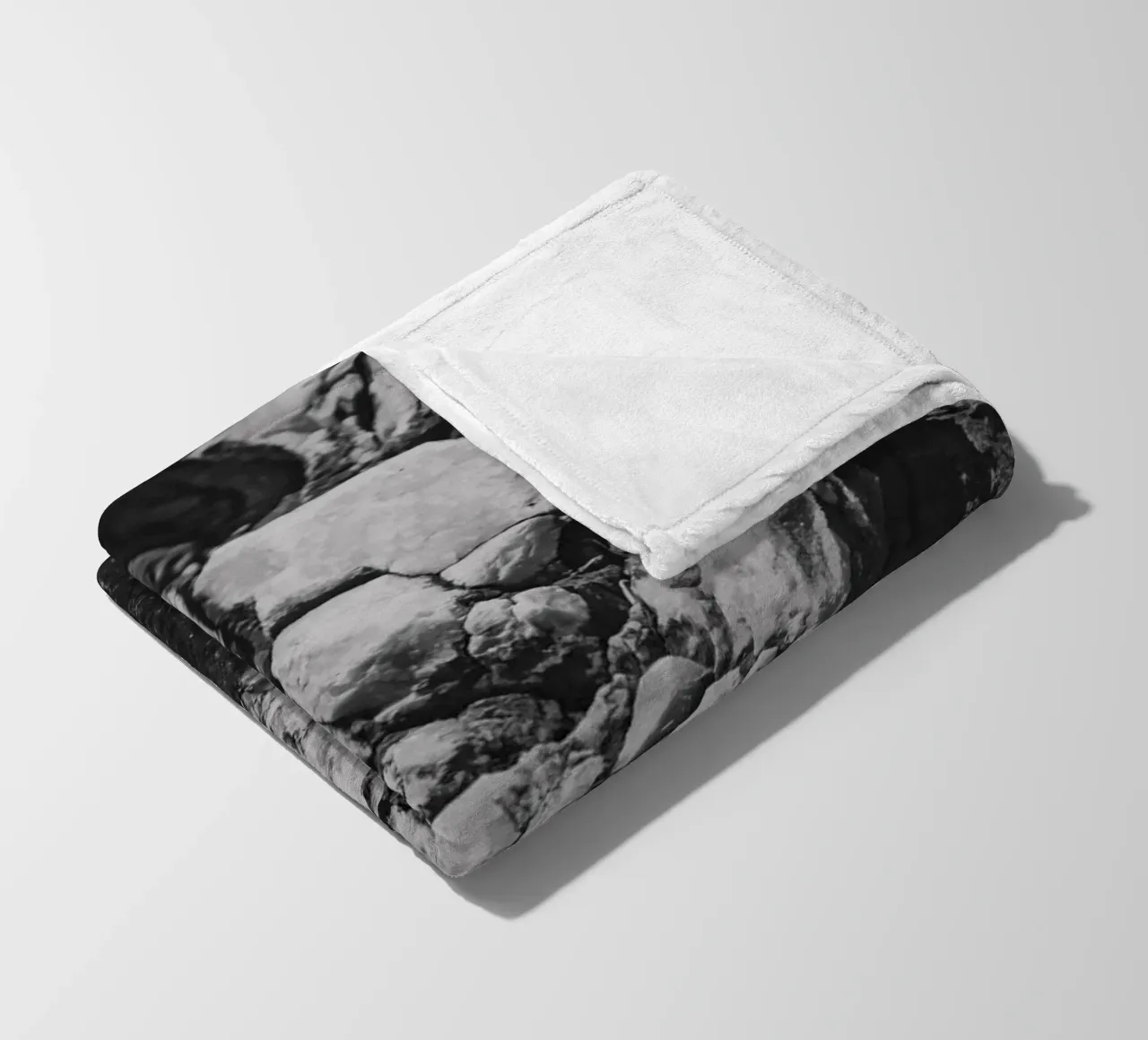 Solid stone structure fleece blanket by Carinaprint