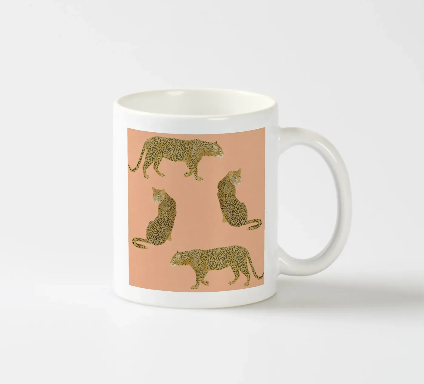 Sunset Leopards ceramic mug by Laura Graves