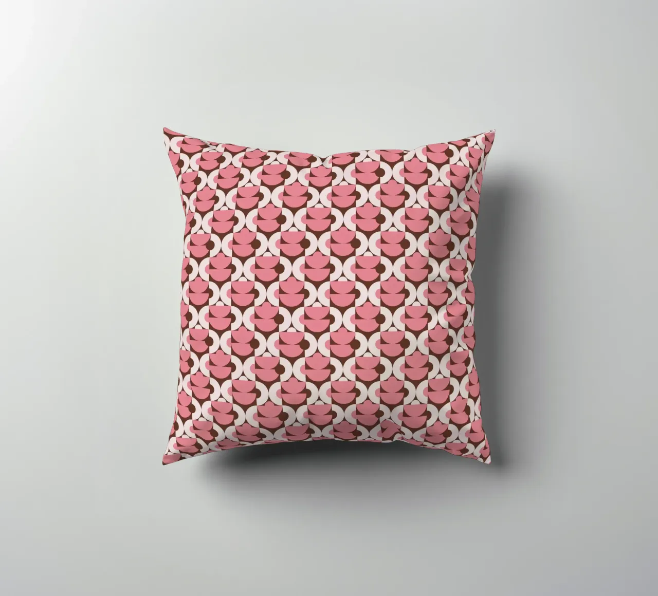 Pink geometrical shaped pattern decorative cushion by Little Dean