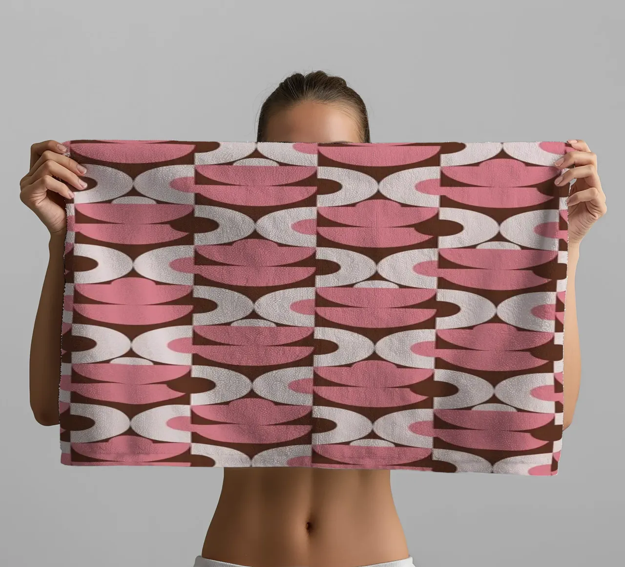 Pink geometrical shaped pattern towel by Little Dean