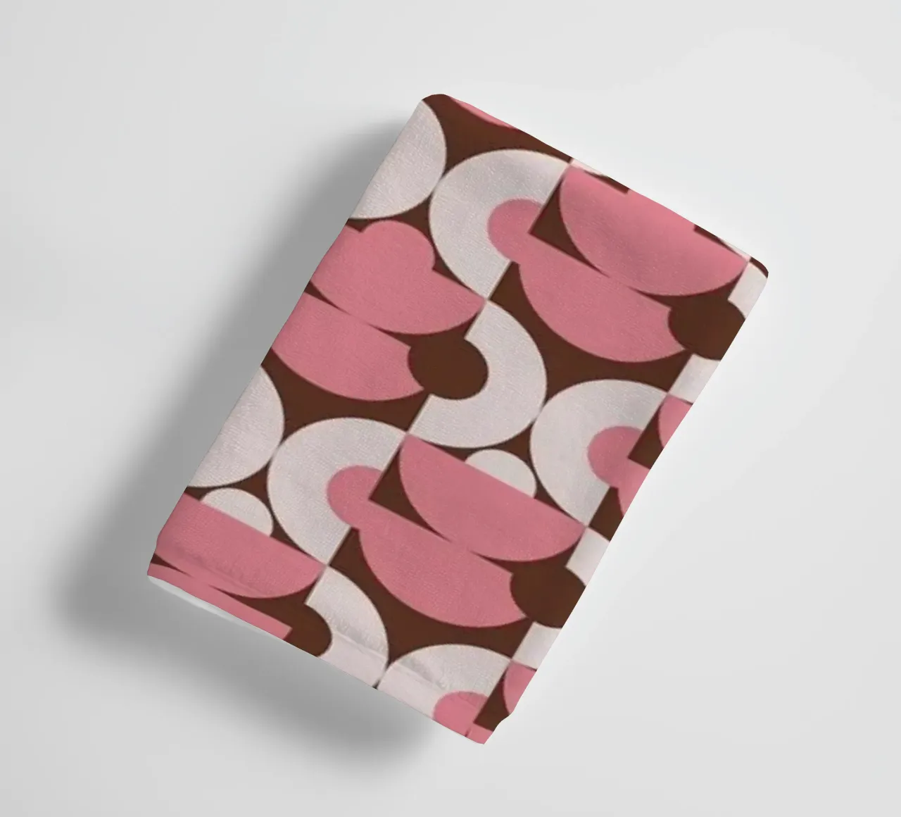 Pink geometrical shaped pattern towel by Little Dean