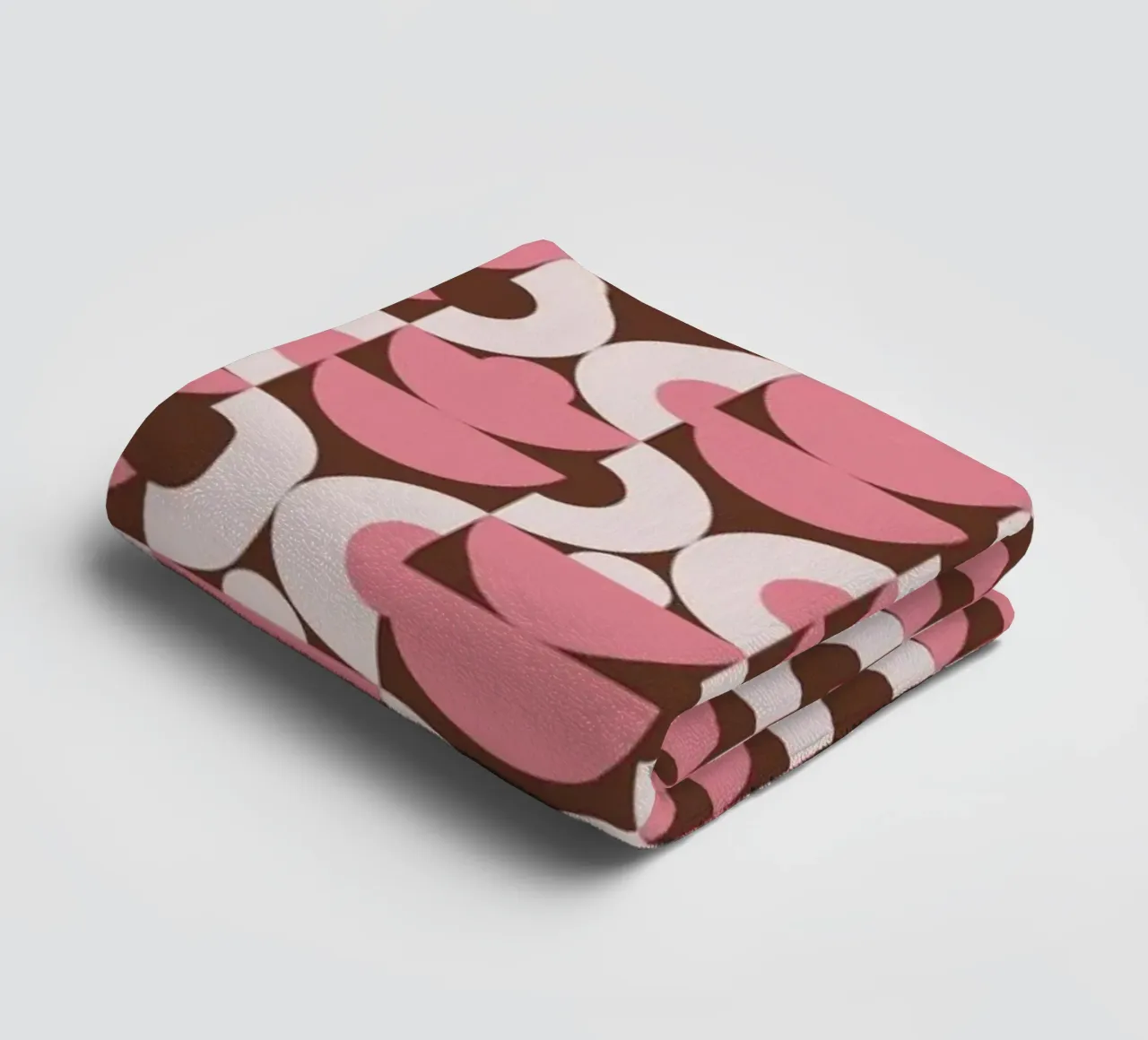 Pink geometrical shaped pattern towel by Little Dean