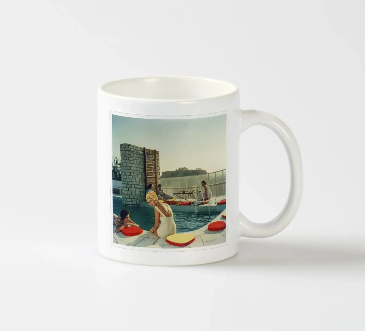 Slim Aarons Penthouse Pool ceramic mug by Carinaprint