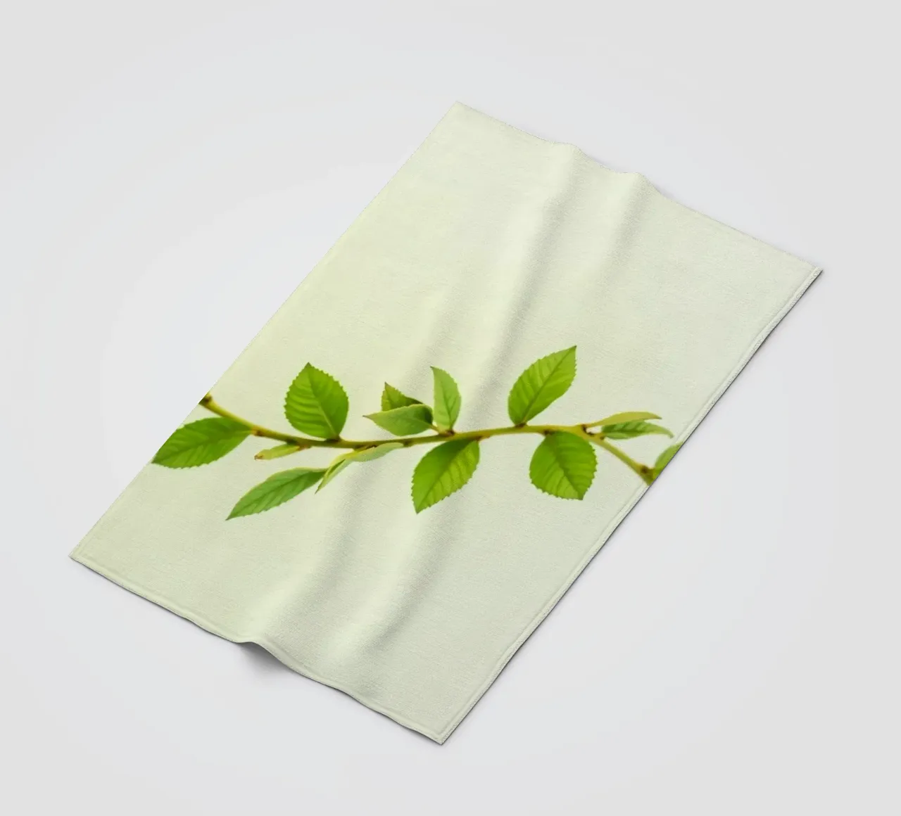 Ramo verde fresco con foglie vivaci su sfondo chiaro coperta in pile da DesignDoodle
