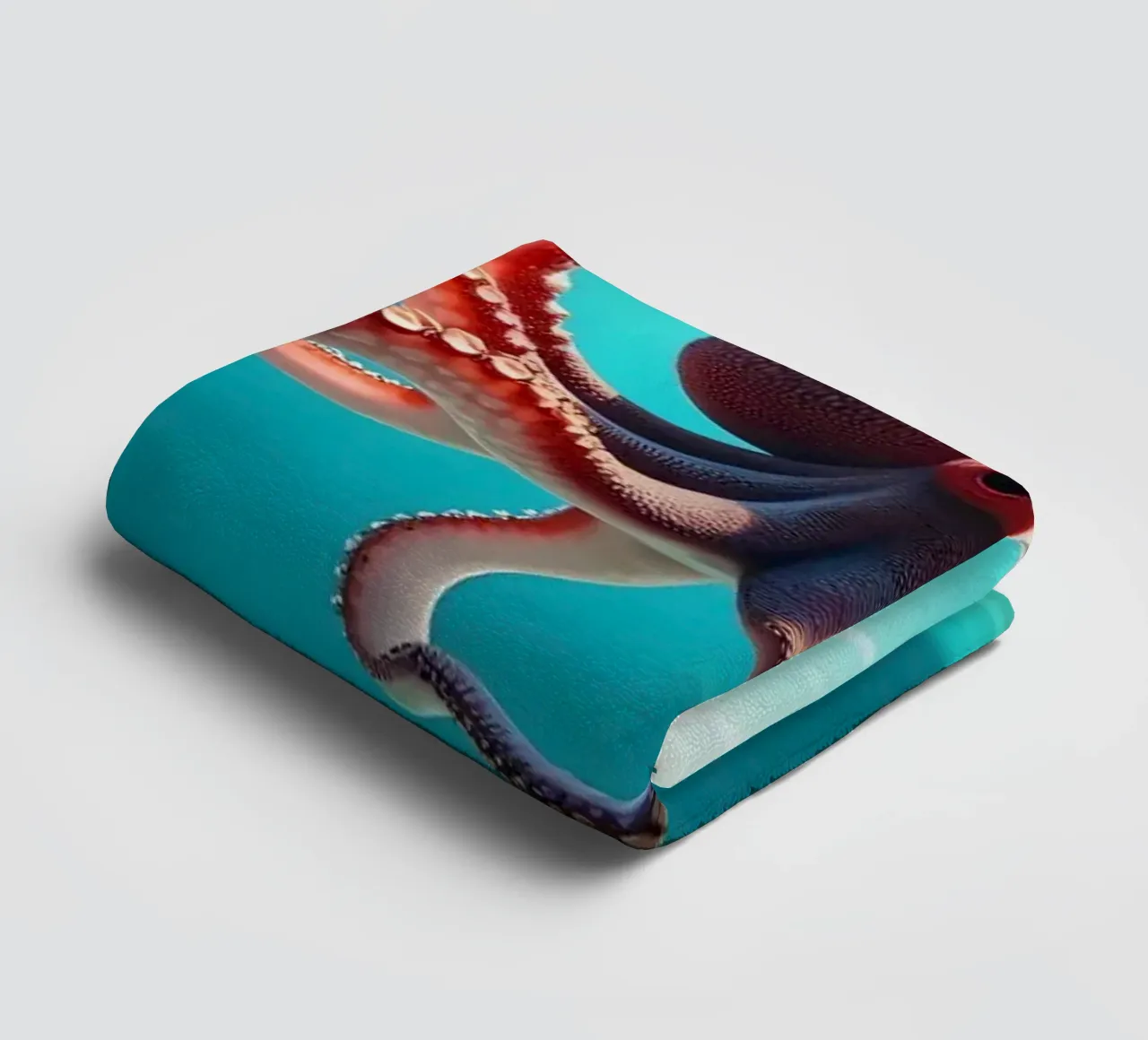 octopus gracefully swimming through coral reef towel by DesignDoodle