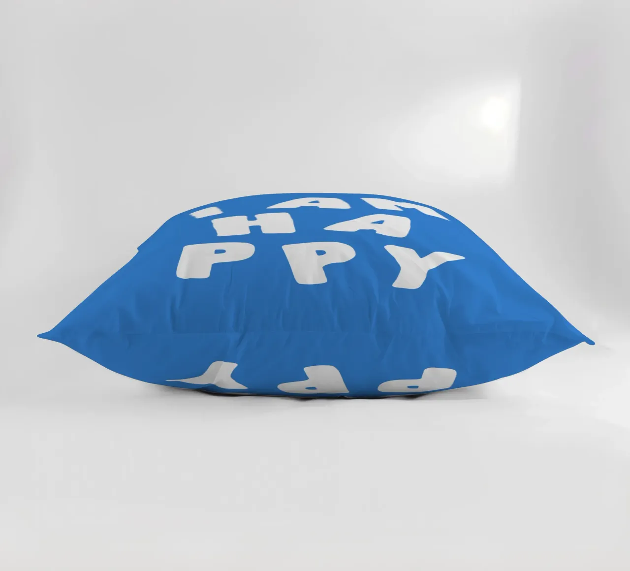 I Am Happy Optimistic Typography Print in White and Blue decorative cushion by THE MOTIVATED TYPE