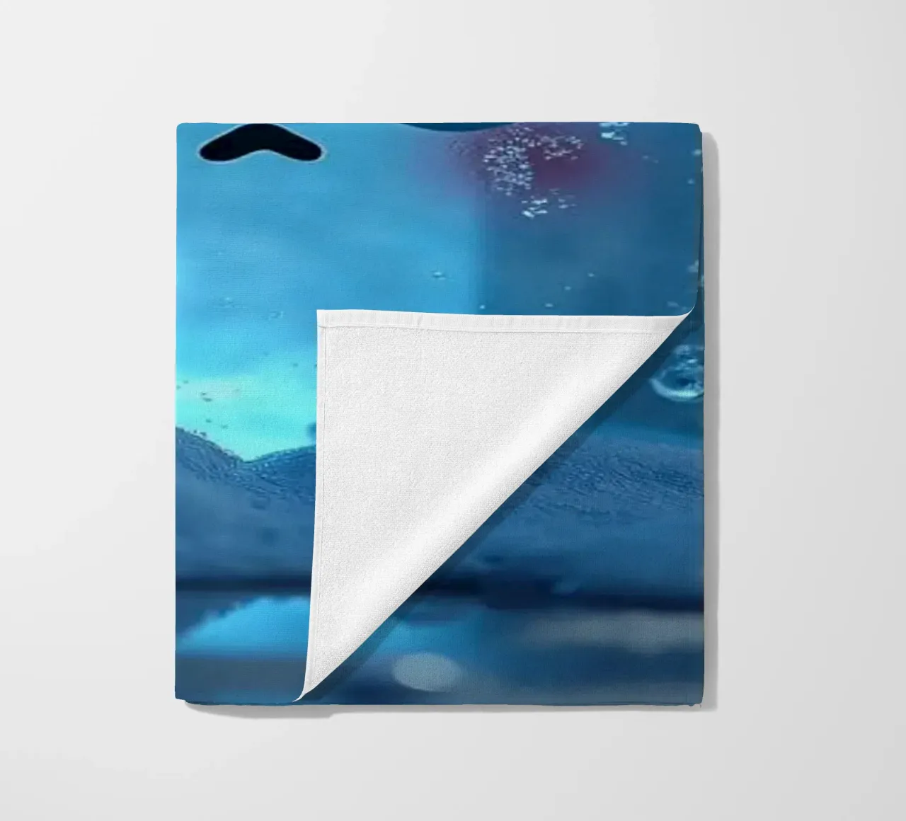 Cute ice cube character surrounded by melting snow and water beach towel by DesignDoodle