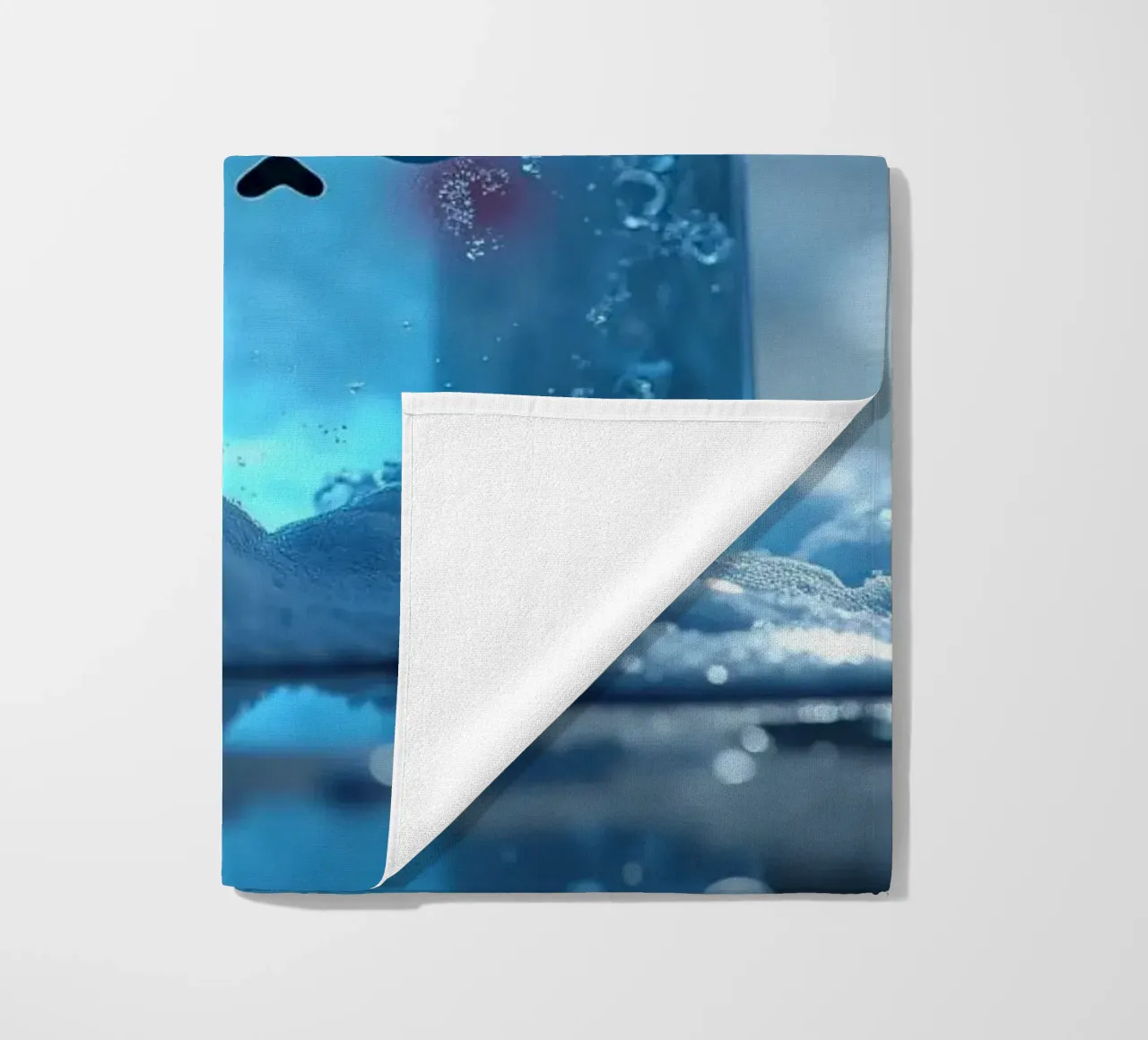 Cute ice cube character surrounded by melting snow and water beach towel by DesignDoodle