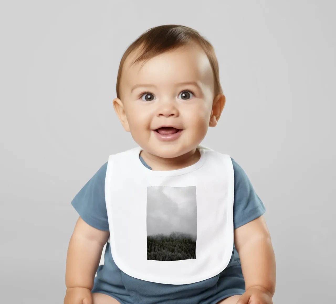 Clouded Forest baby bib by Nur Mut