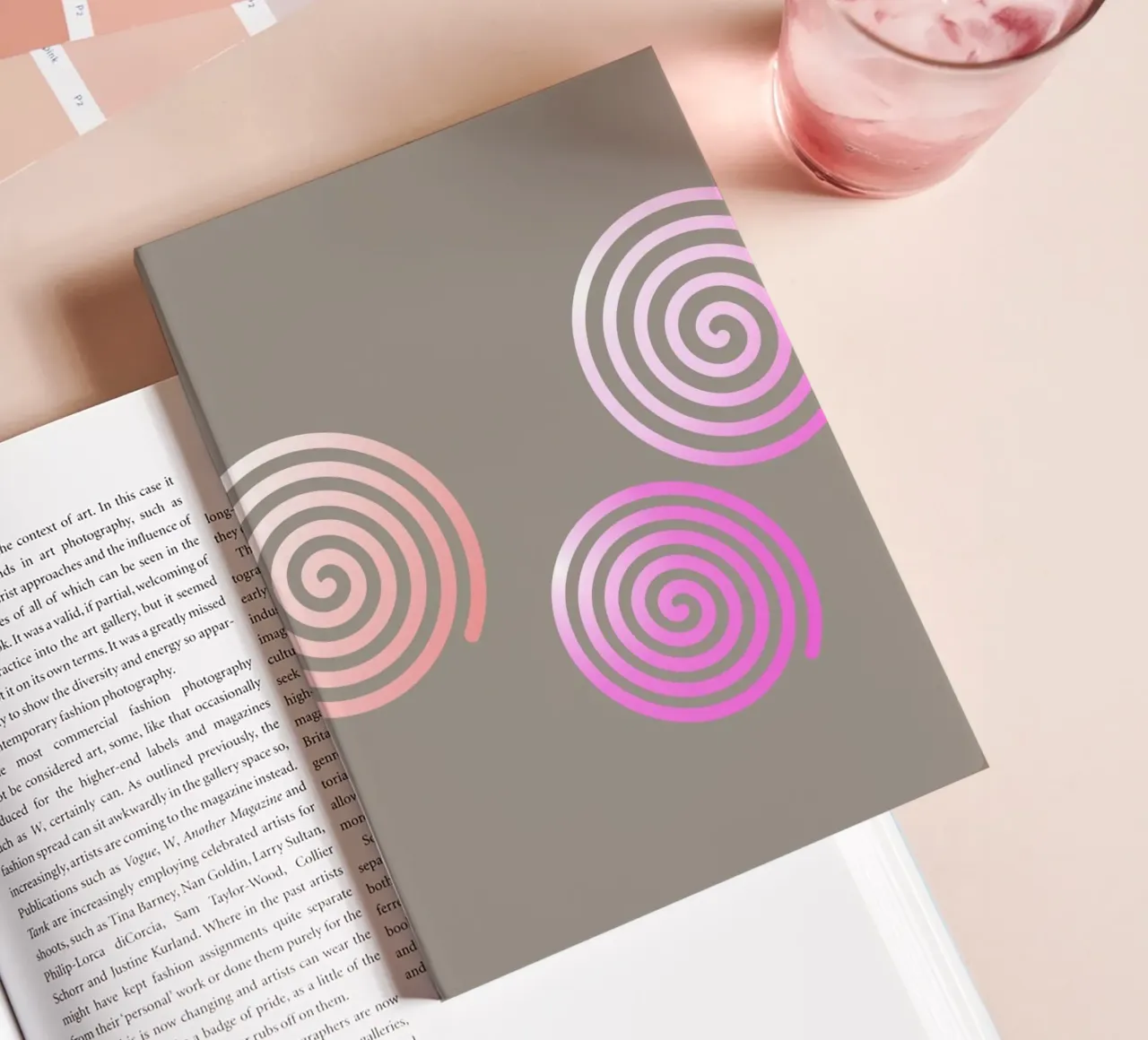 Three pink spirals on a grey background notebook by Something for you