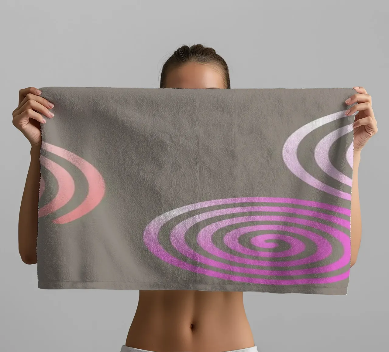 Three pink spirals on a grey background towel by Something for you