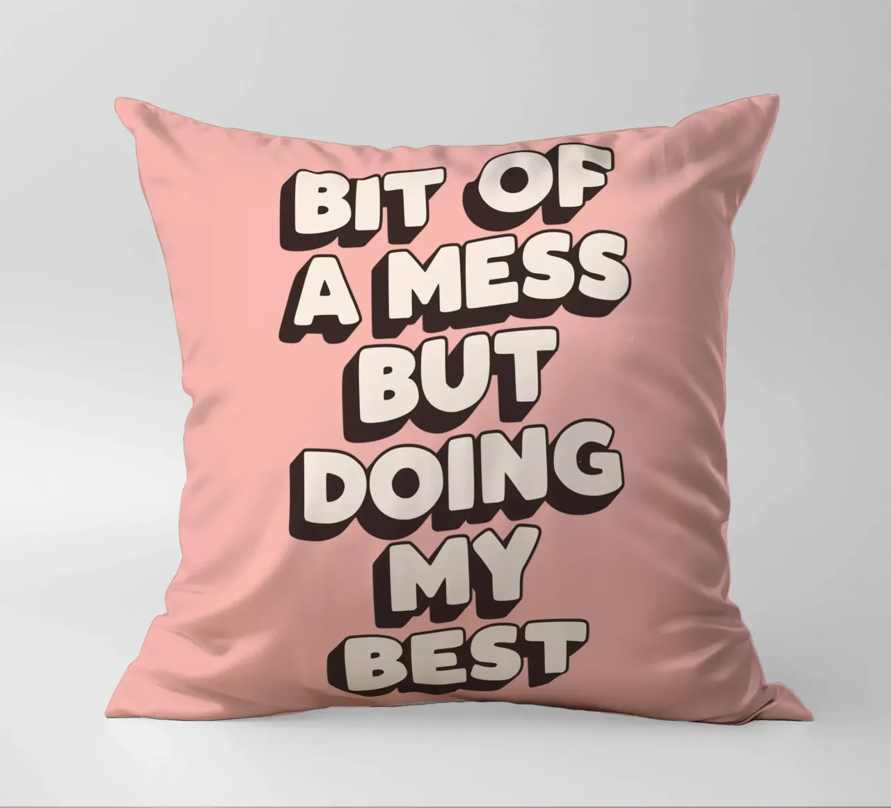 Bit of a Mess But Doing my Best Typography Print Peach Pink decorative cushion by THE MOTIVATED TYPE