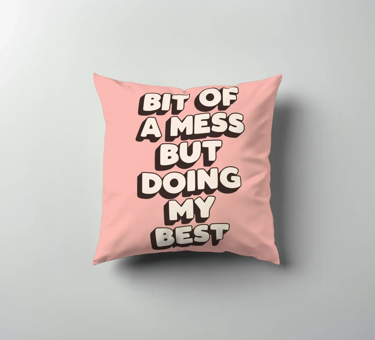 Bit of a Mess But Doing my Best Typography Print Peach Pink decorative cushion by THE MOTIVATED TYPE