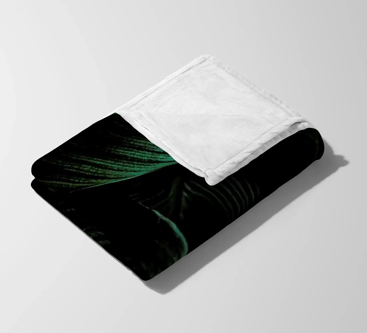 Layered Leaves fleece blanket by Flora & Fauna