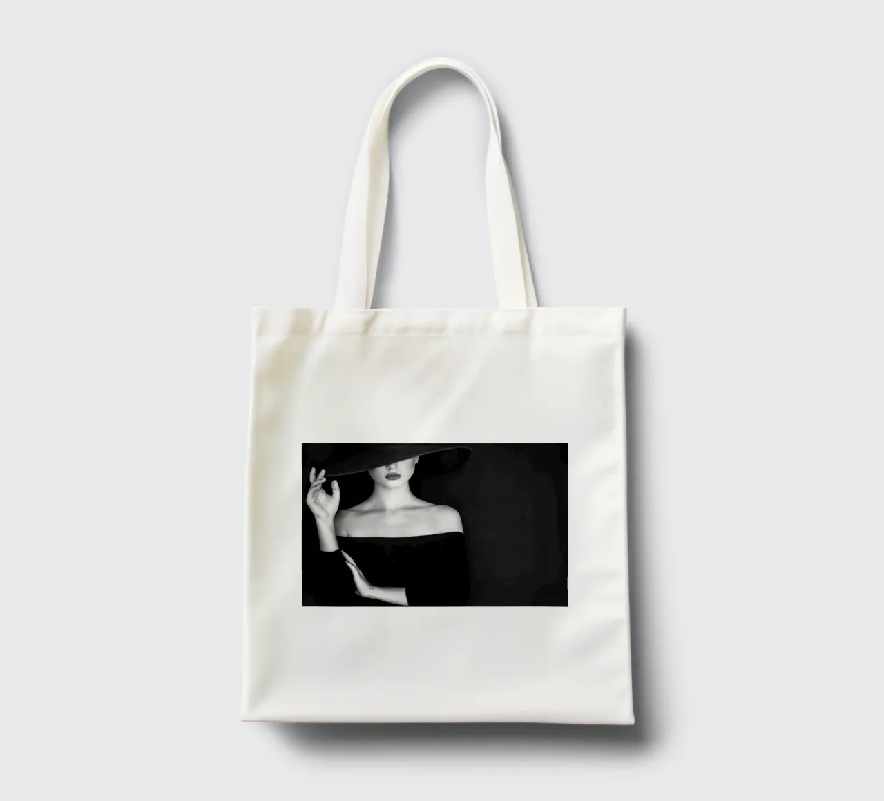 Beautiful Woman Wearing a Hat tote bag by Lorraine Mooore