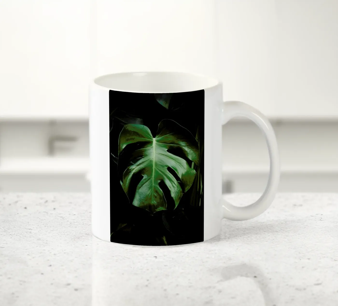 Monstera Leaf ceramic mug by Ingrid Beddoes