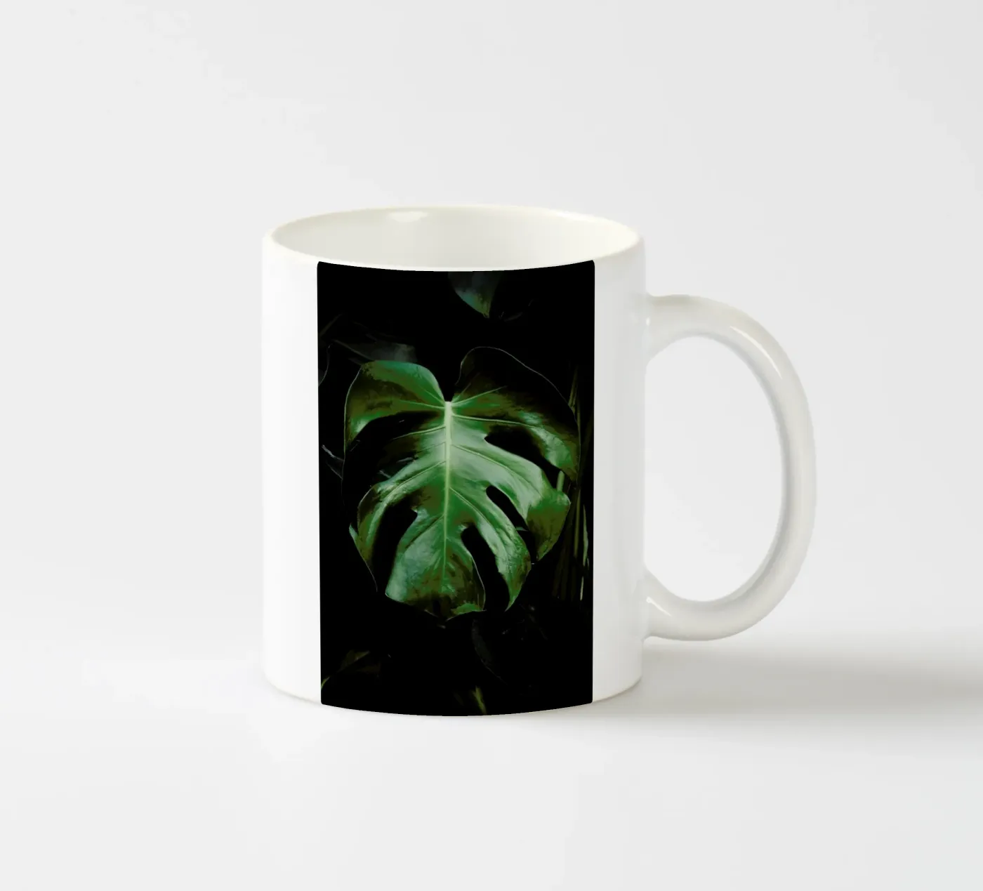 Monstera Leaf ceramic mug by Ingrid Beddoes