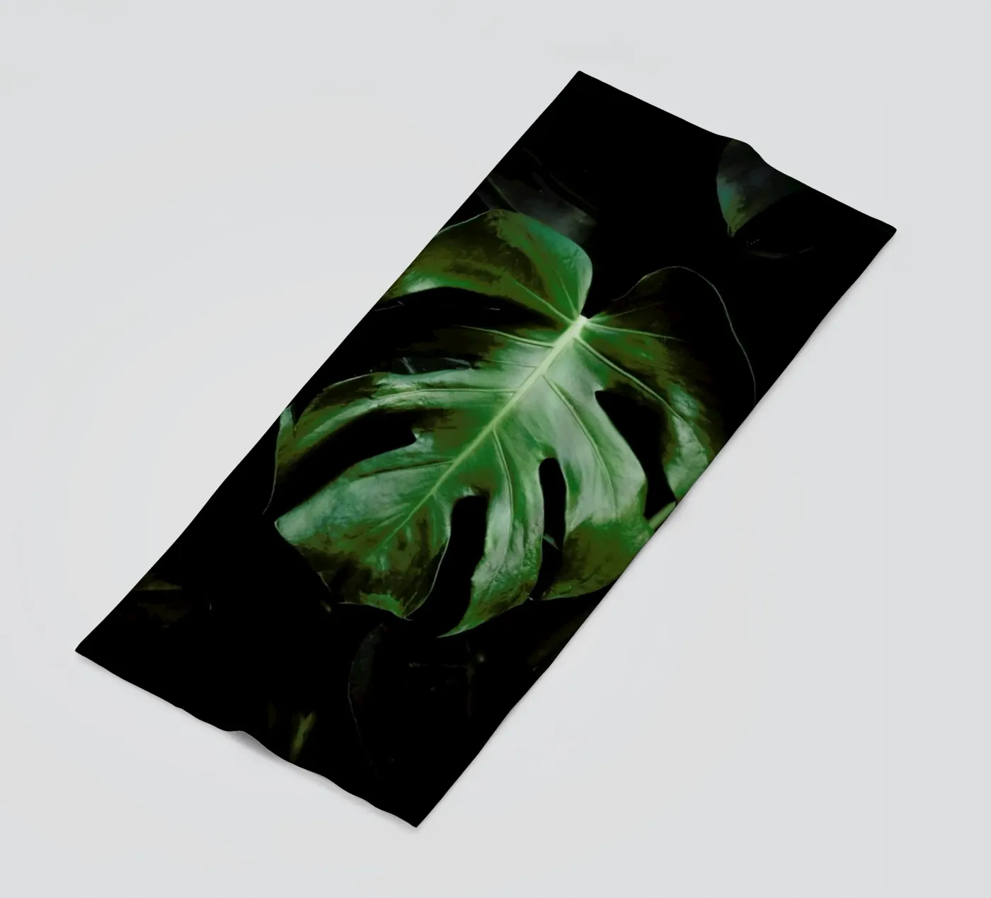 Monstera Leaf beach towel by Ingrid Beddoes