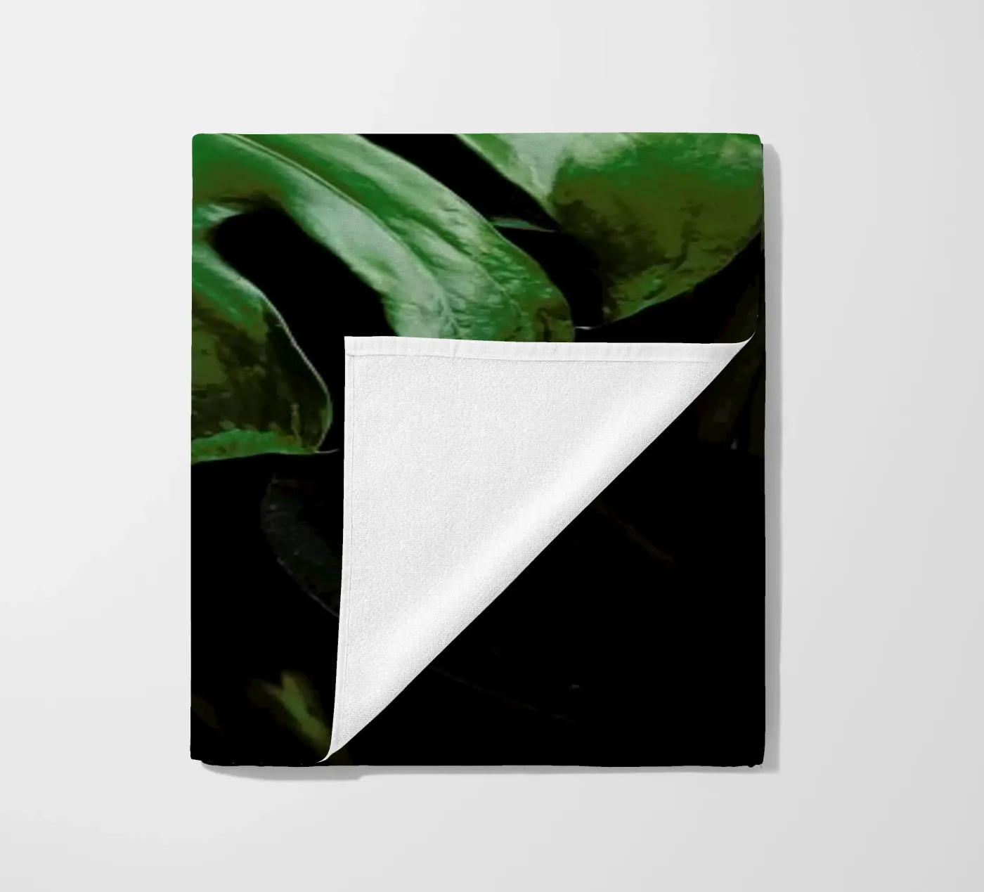 Monstera Leaf beach towel by Ingrid Beddoes