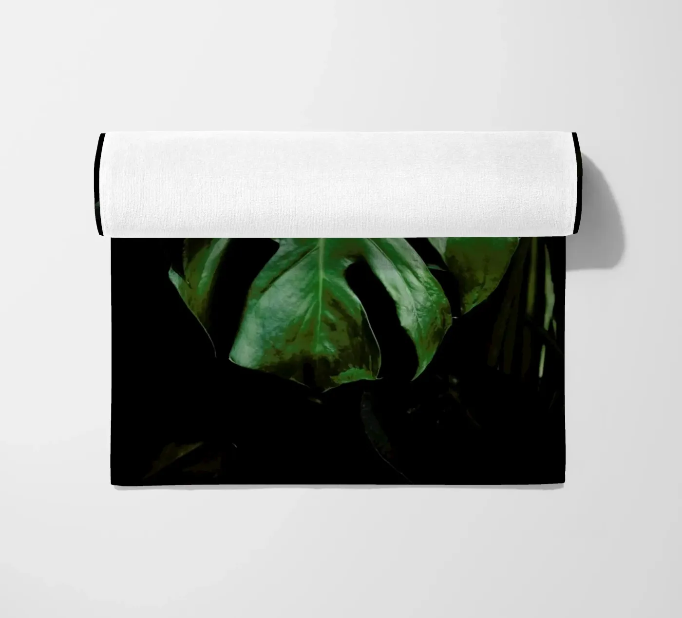 Monstera Leaf beach towel by Ingrid Beddoes