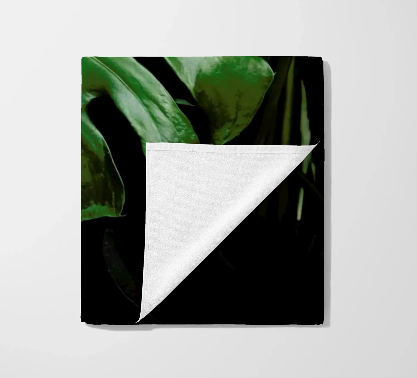 Monstera Leaf beach towel by Ingrid Beddoes