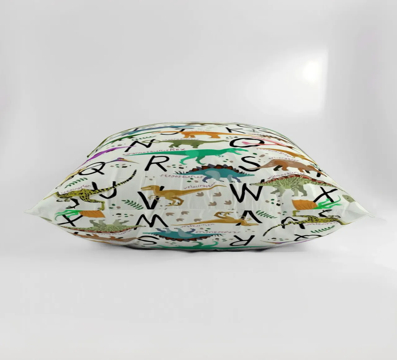 Dino Alphabet cuscino da Little Flourishes