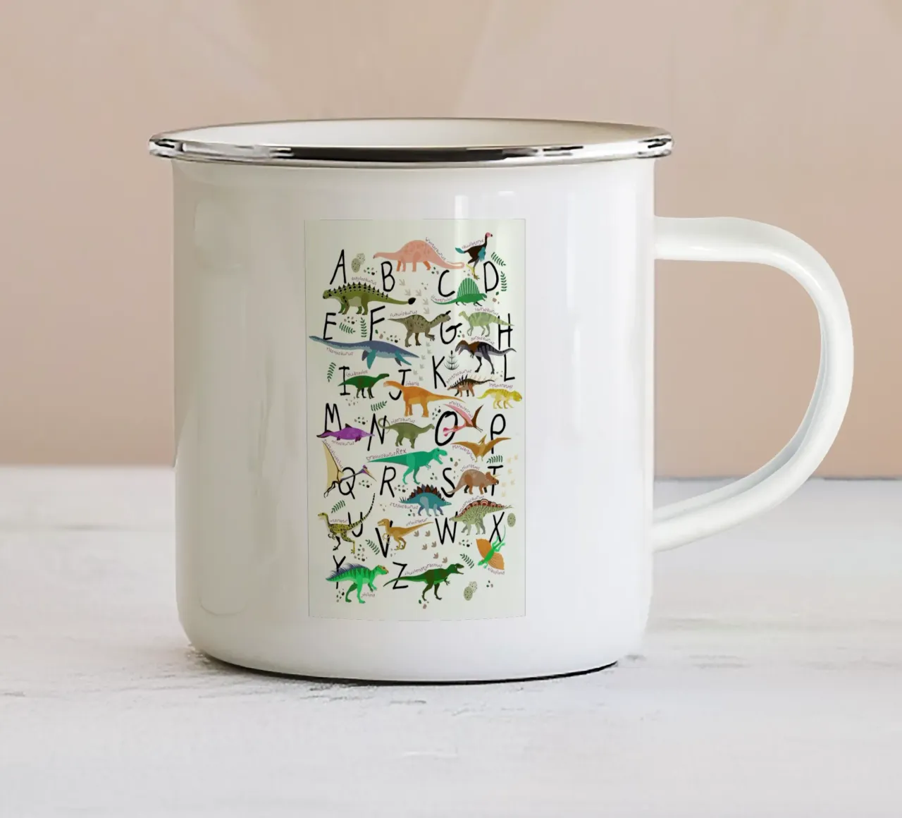 Dino Alphabet taza de esmalte de Little Flourishes