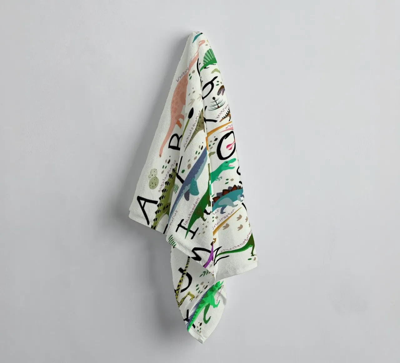 Dino Alphabet towel by Little Flourishes