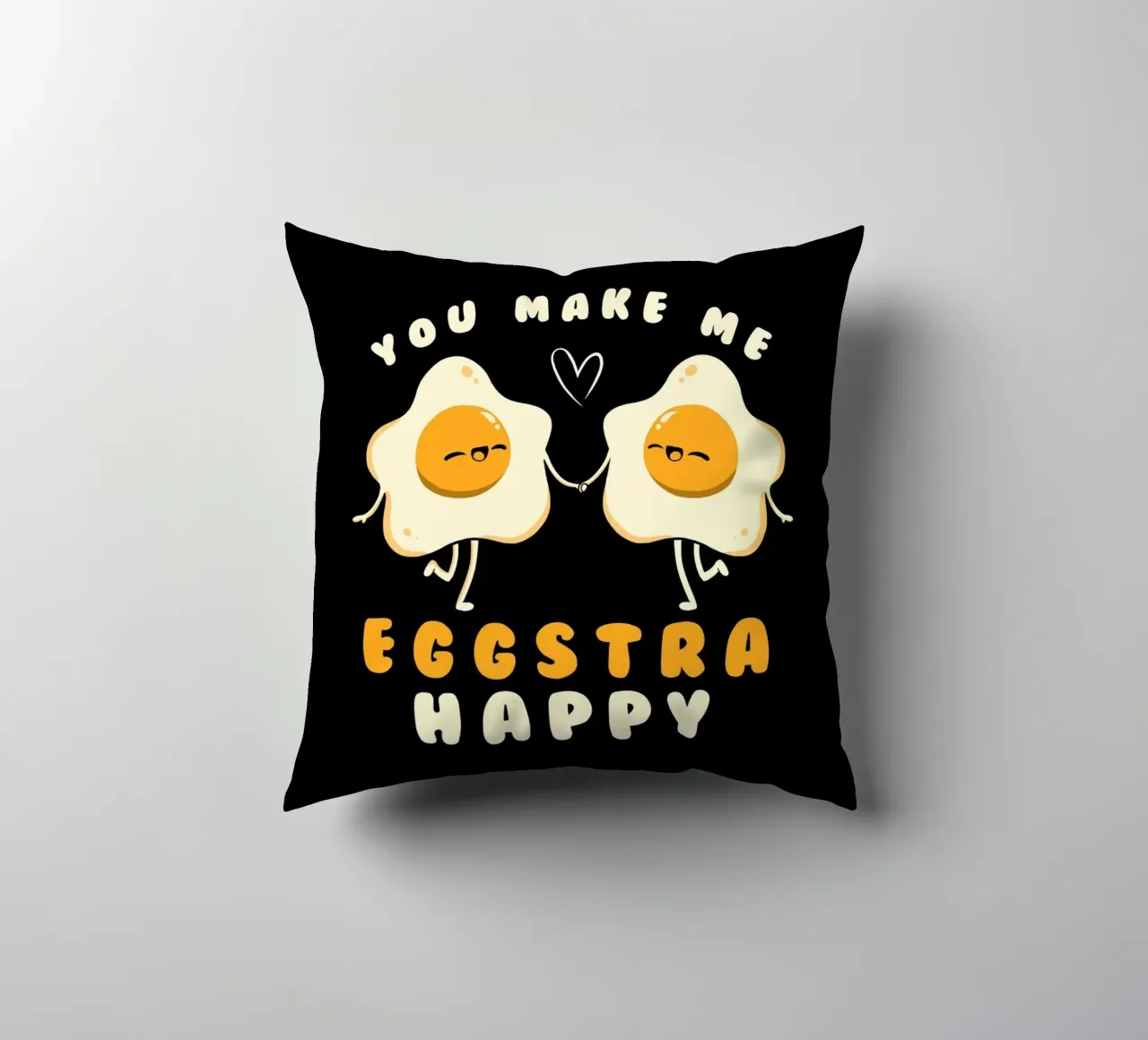 You Make Me Eggstra Happy decorative cushion by Tobe Fonseca