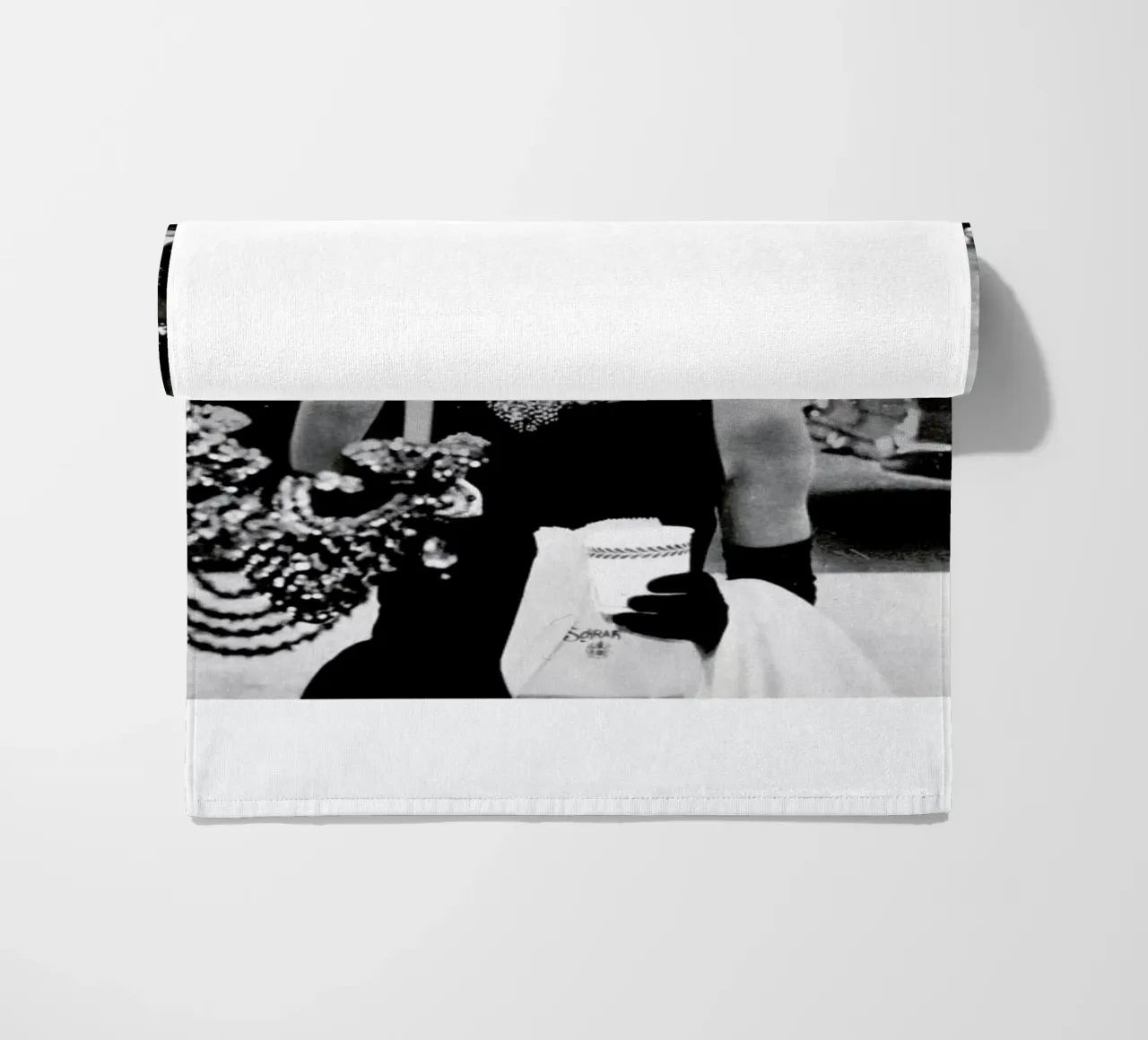 Audrey Hepburn in Breakfast at Tiffany's, 1961 beach towel by Gallery Print and Art Limited
