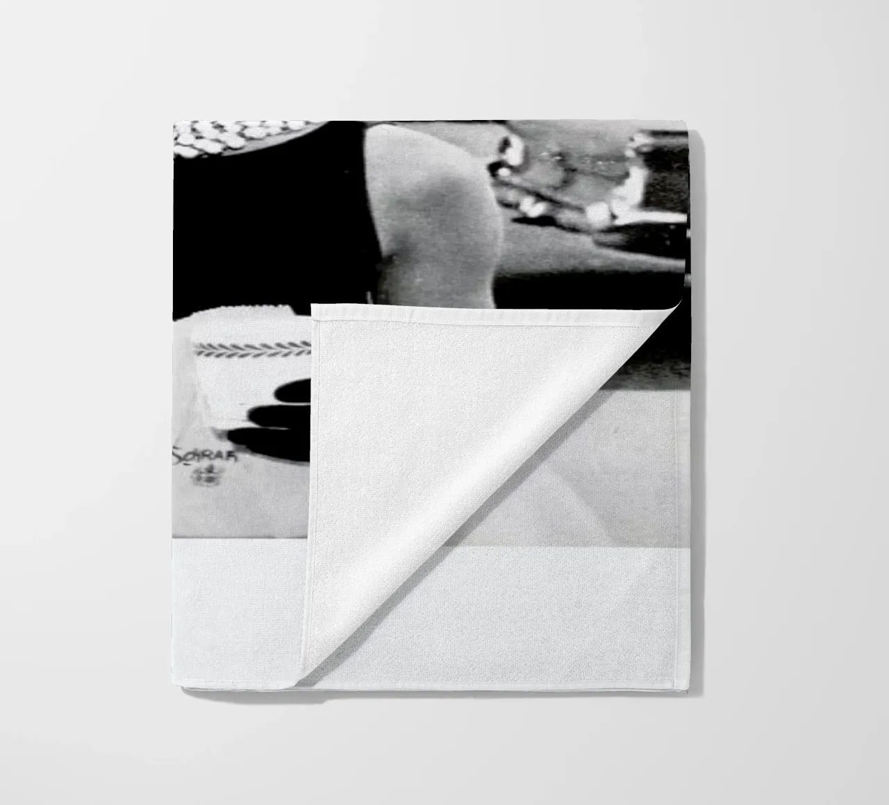 Audrey Hepburn in Breakfast at Tiffany's, 1961 beach towel by Gallery Print and Art Limited