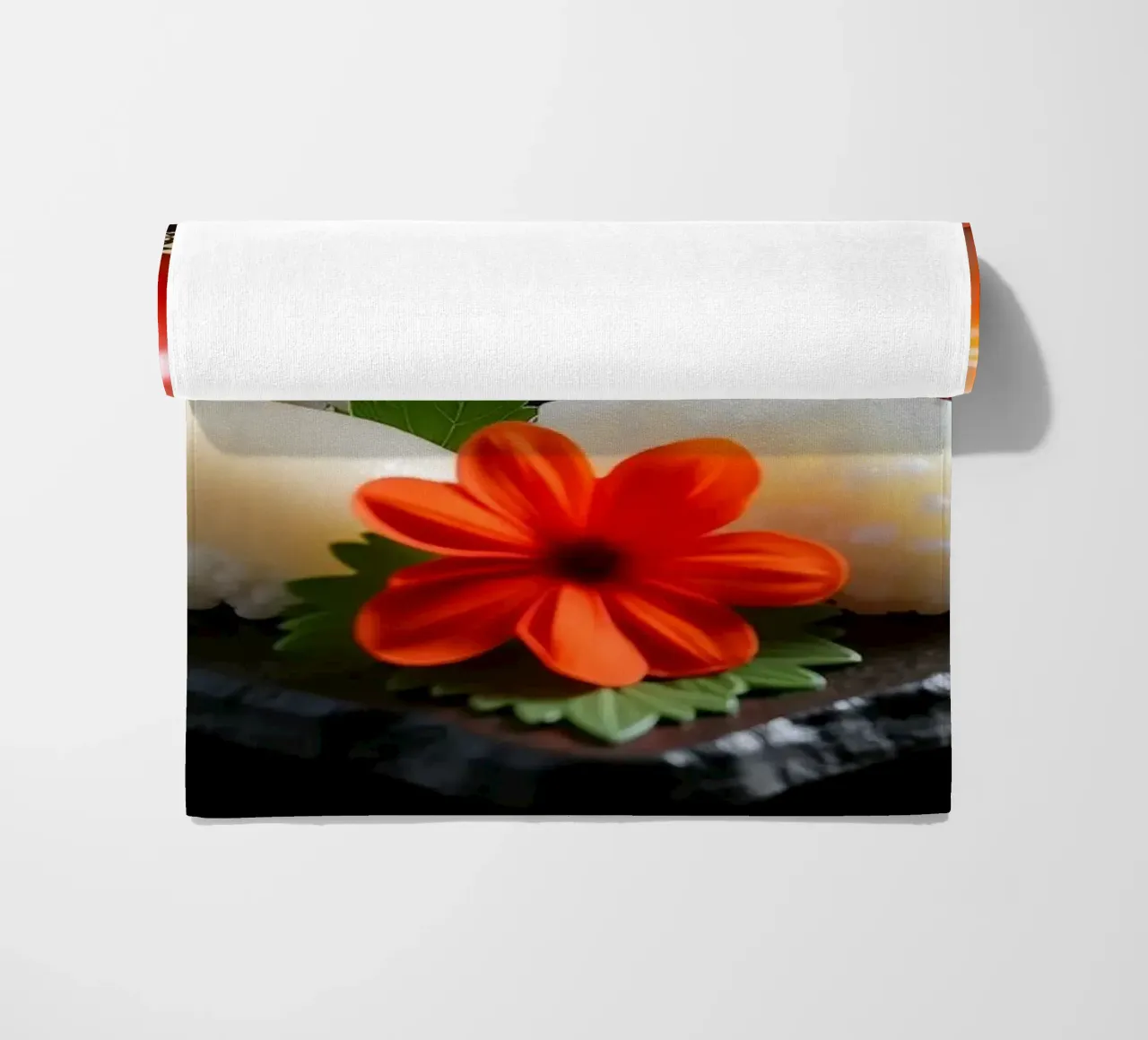 Piatto di sushi colorato disposto a forma di cuore con fiori telo mare da DesignDoodle