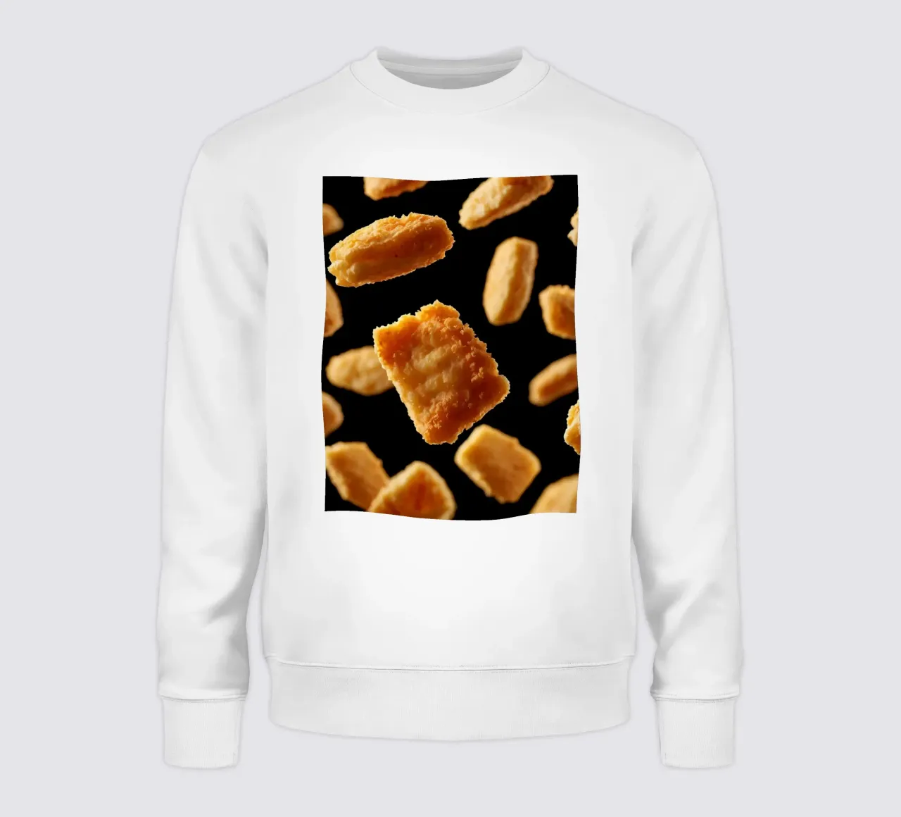 Nuggets in mid-air create a dynamic culinary display sweatshirt by DesignDoodle