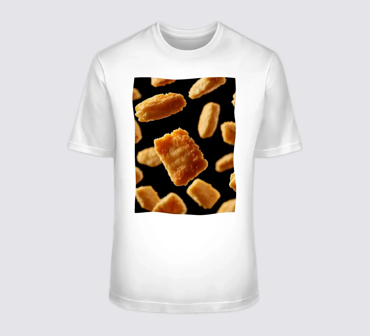 Nuggets in mid-air create a dynamic culinary display t-shirt by DesignDoodle