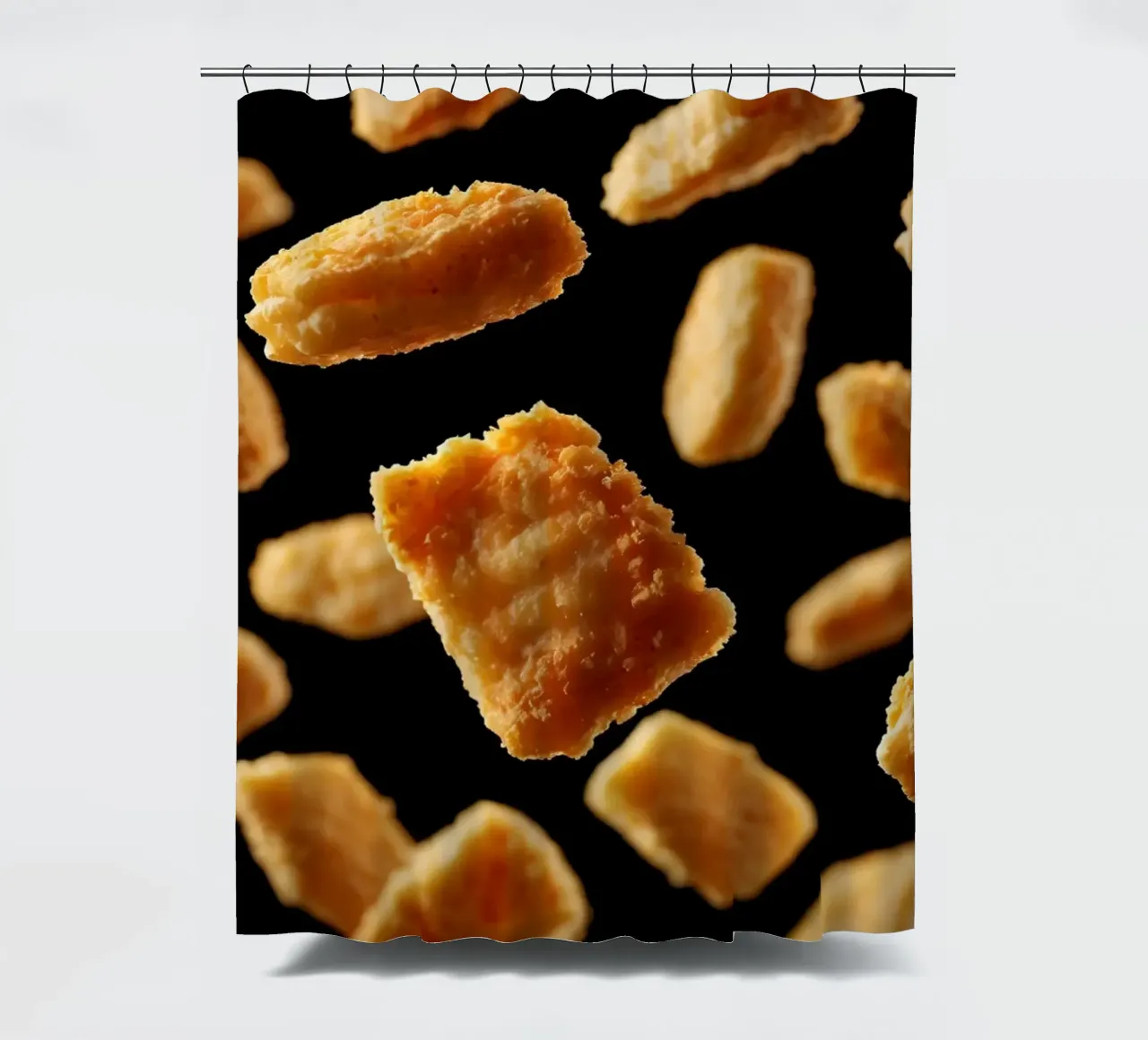 Nuggets in mid-air create a dynamic culinary display shower curtain by DesignDoodle