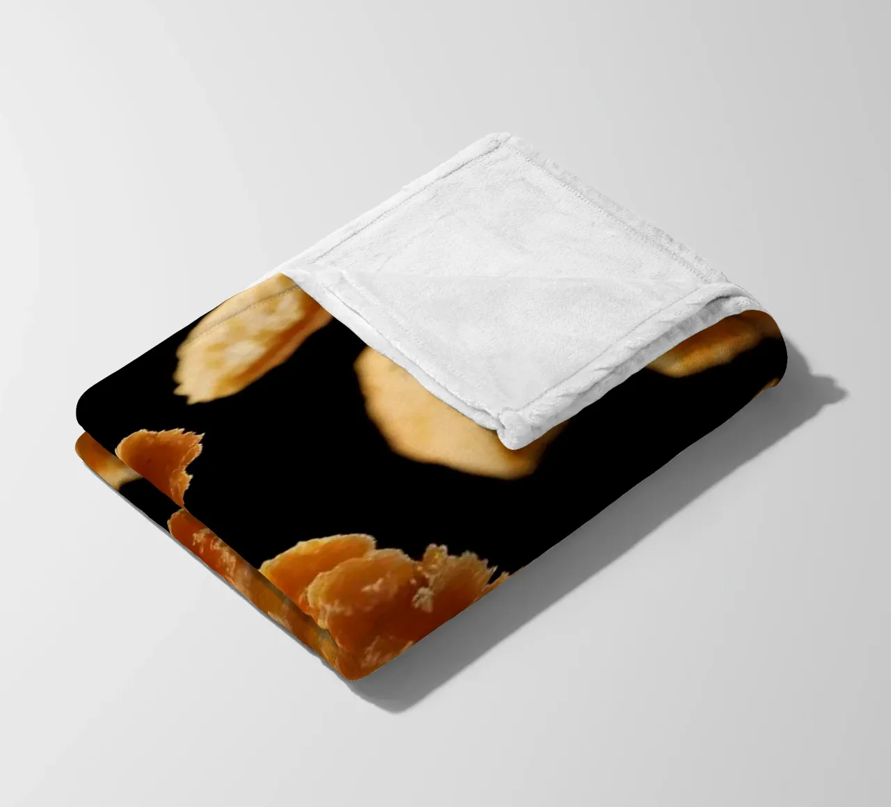 Nuggets in mid-air create a dynamic culinary display fleece blanket by DesignDoodle