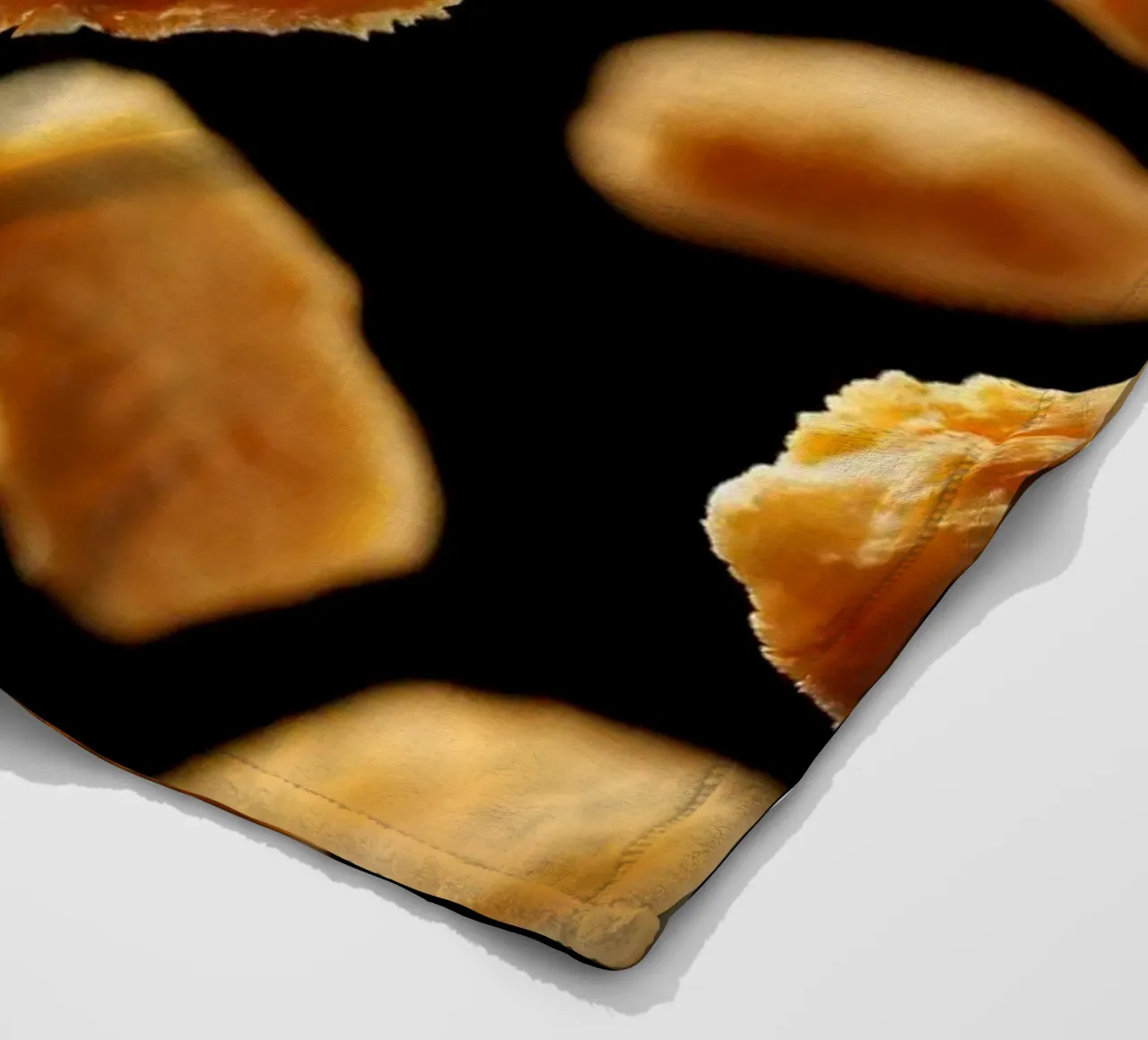 Nuggets in mid-air create a dynamic culinary display fleece blanket by DesignDoodle