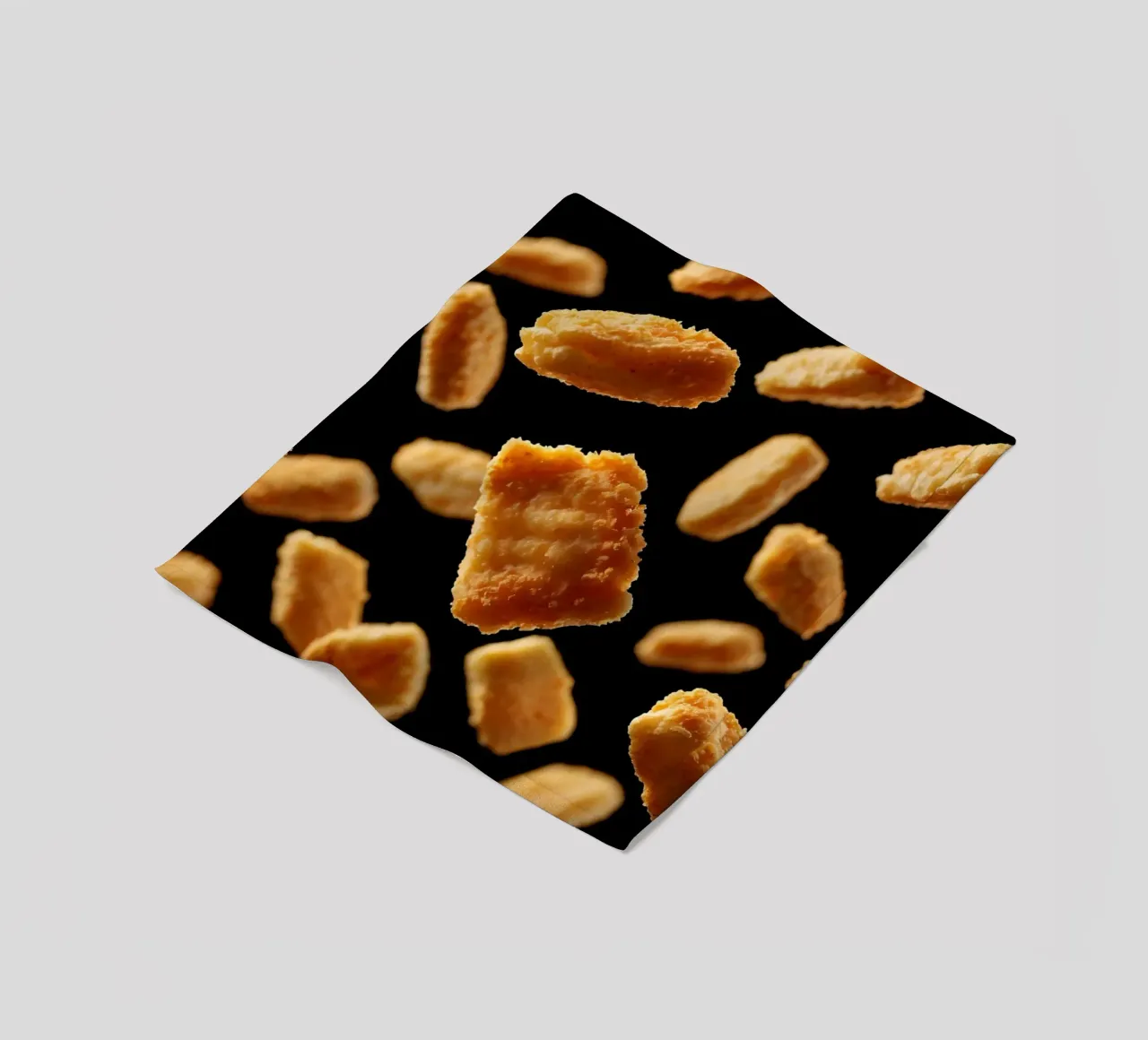 Nuggets in mid-air create a dynamic culinary display fleece blanket by DesignDoodle