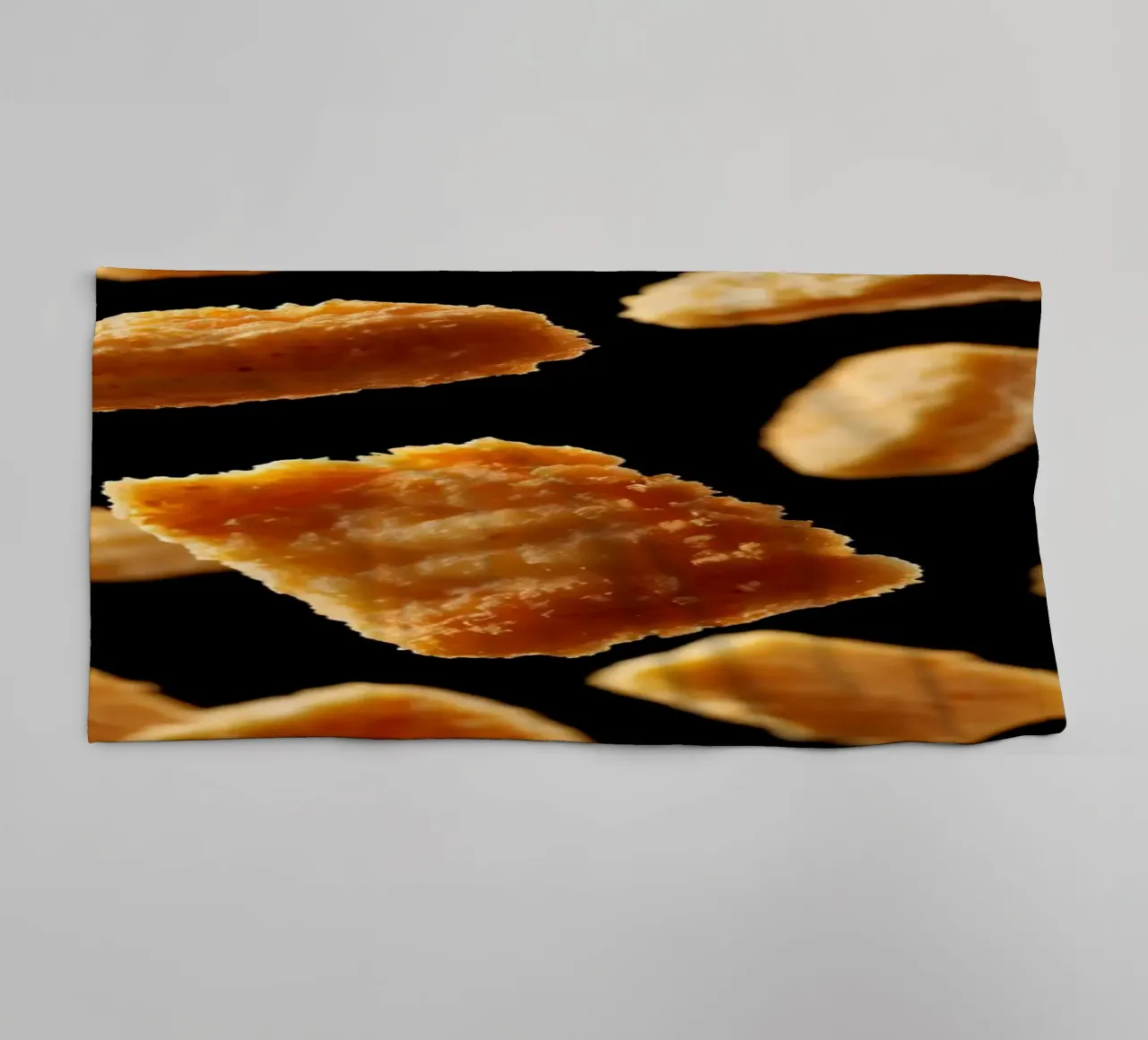 Nuggets in mid-air create a dynamic culinary display towel by DesignDoodle